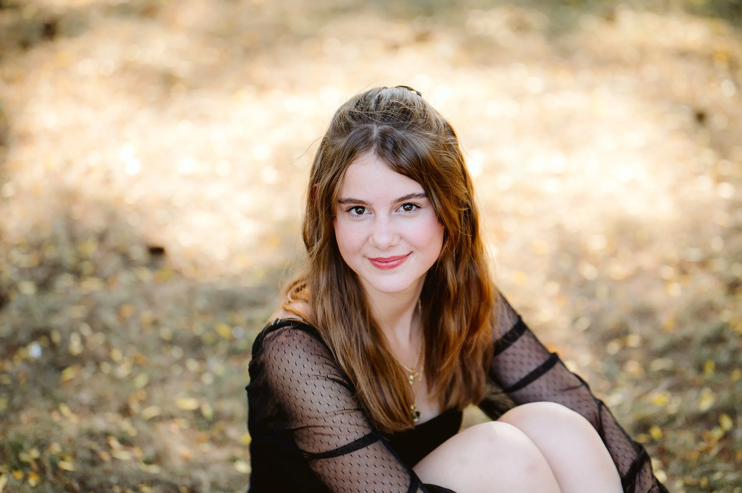Close-up senior portrait photographed in Vancouver Washington, highlighting natural expression, soft light, and a shallow depth of field.