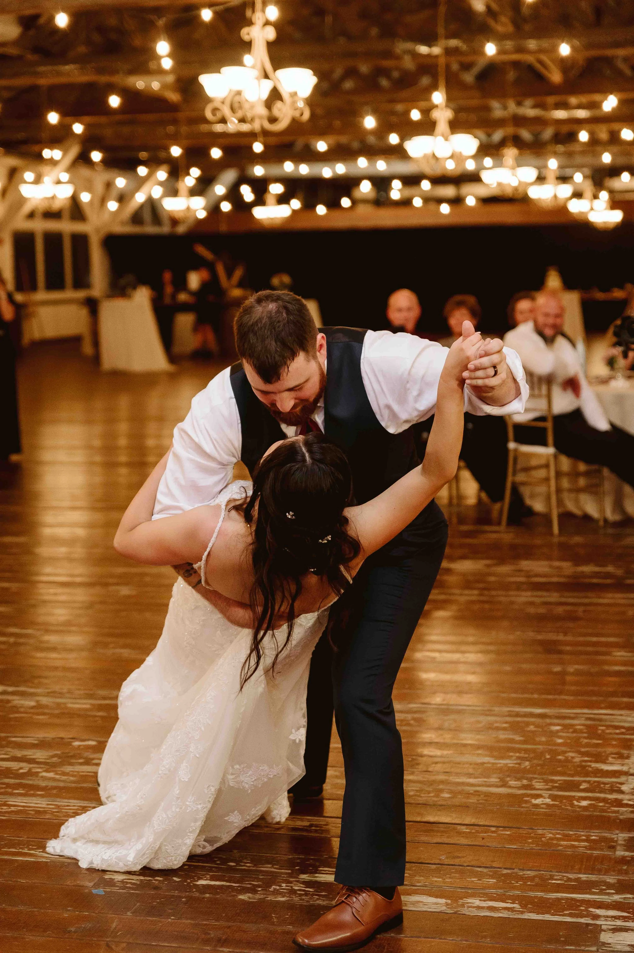 Bride and groom sharing their first dance during a wedding reception at Carnation Farms near Seattle, Washington.