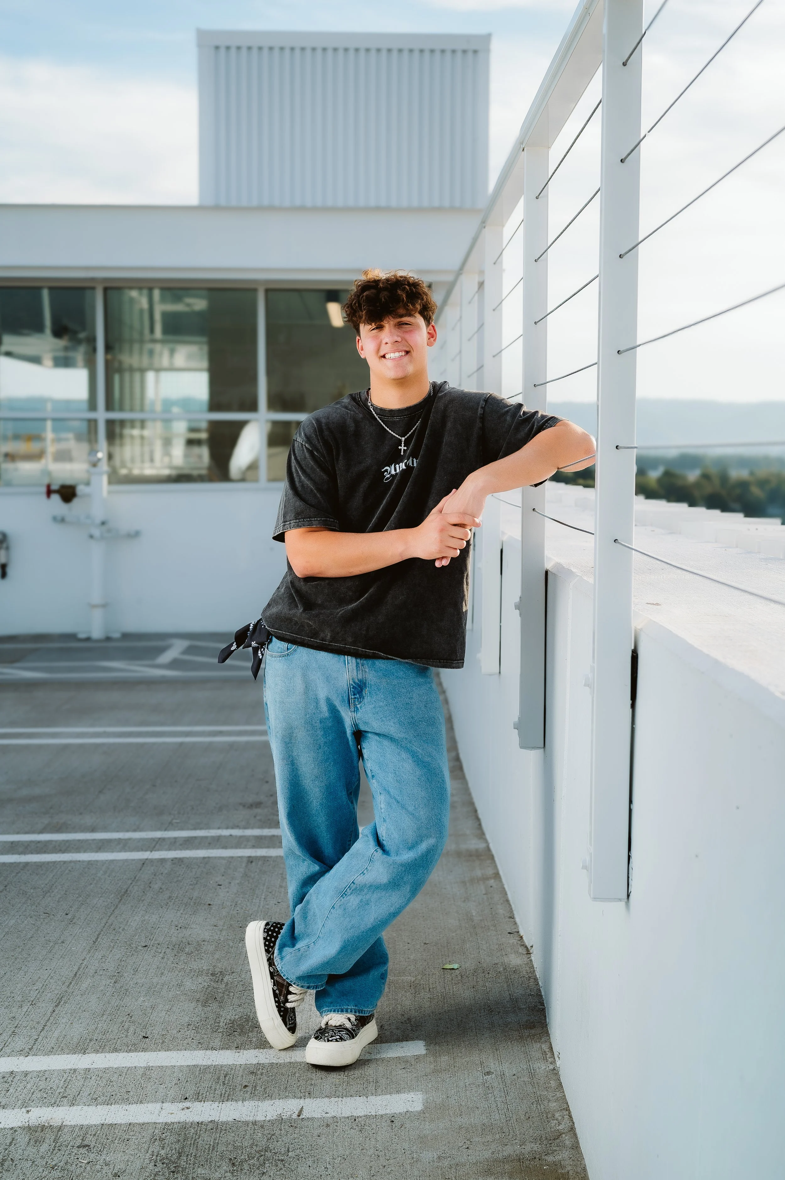 Senior portrait photography in Portland, Oregon capturing relaxed lifestyle poses in urban environments.