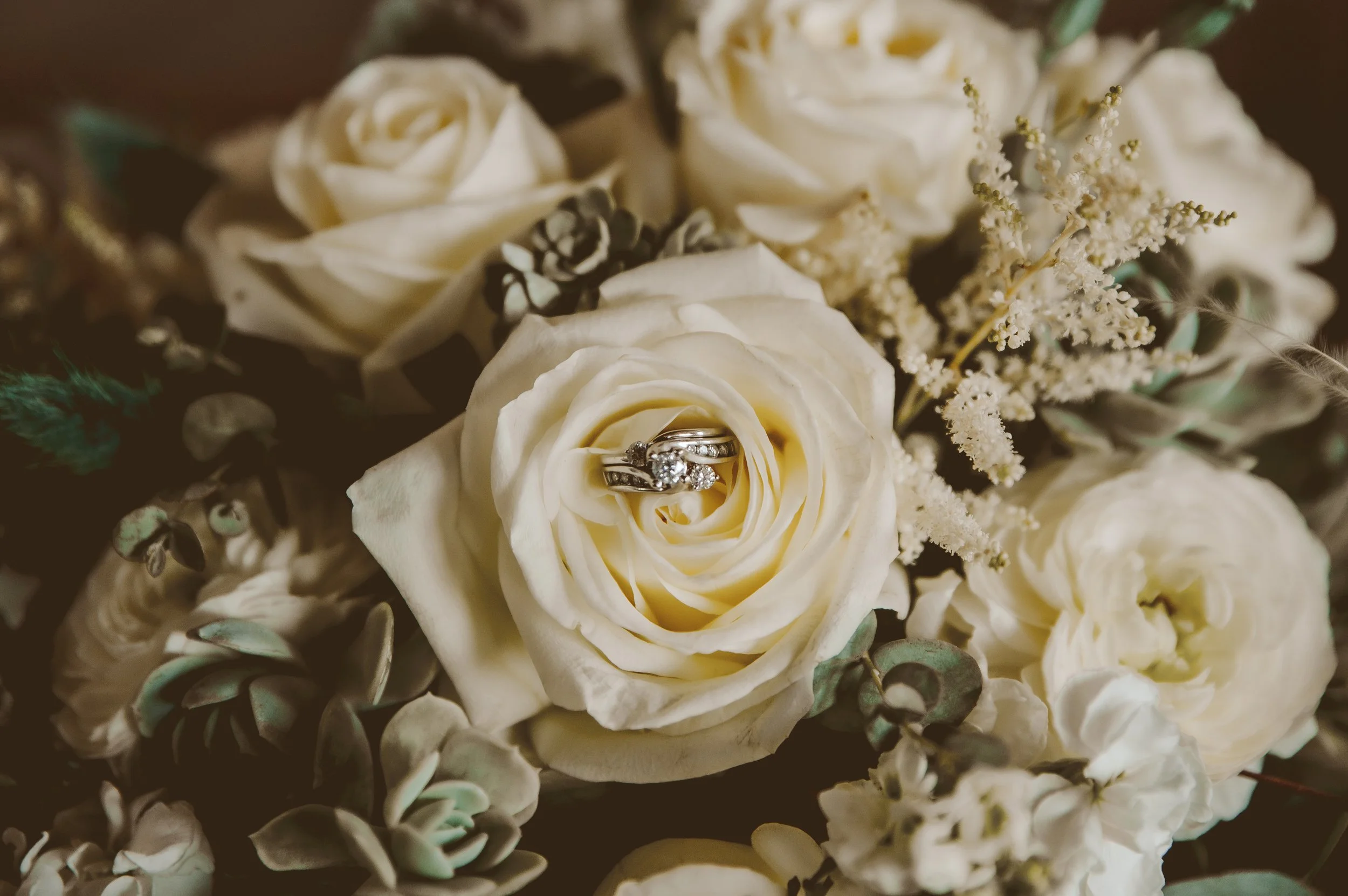 Wedding rings and bridal bouquet details for a courthouse wedding in Portland Oregon