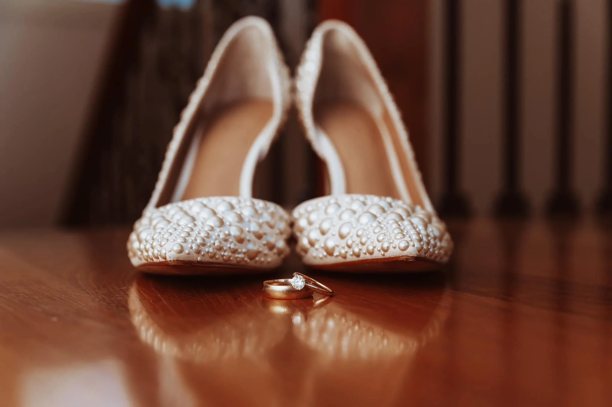 Bridal shoes and wedding rings detail from intimate wedding in Vancouver Washington