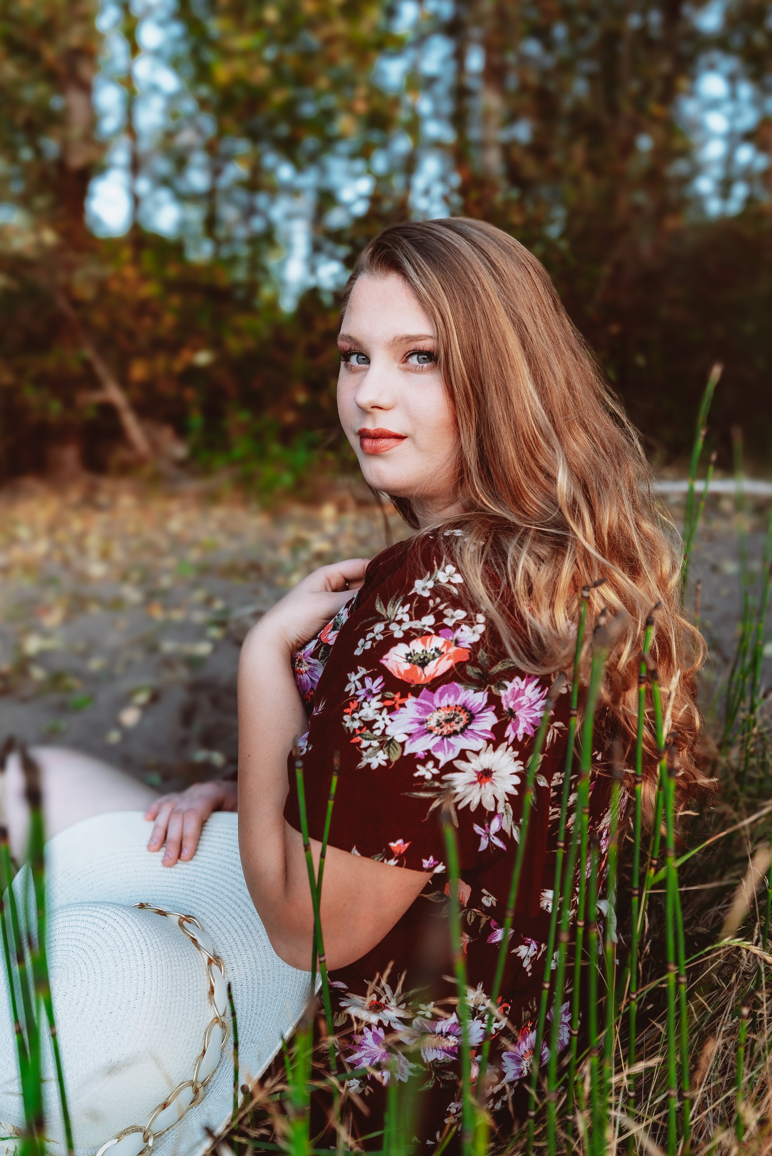 Natural light senior portrait taken in Vancouver Washington, focusing on a high school senior’s personality and relaxed outdoor style.