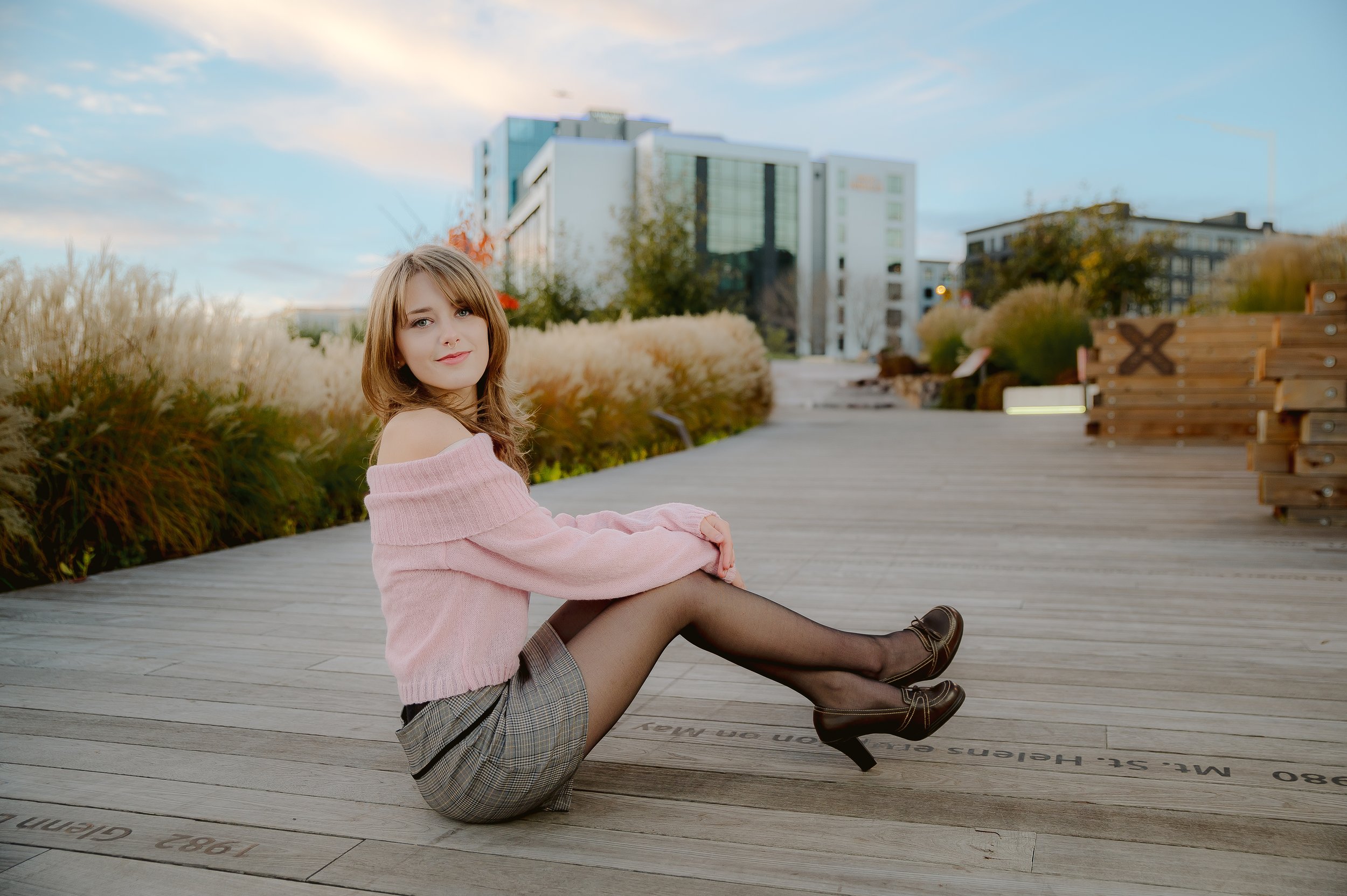 Outdoor senior portrait photographed in Vancouver Washington, blending modern styling with a clean urban backdrop.