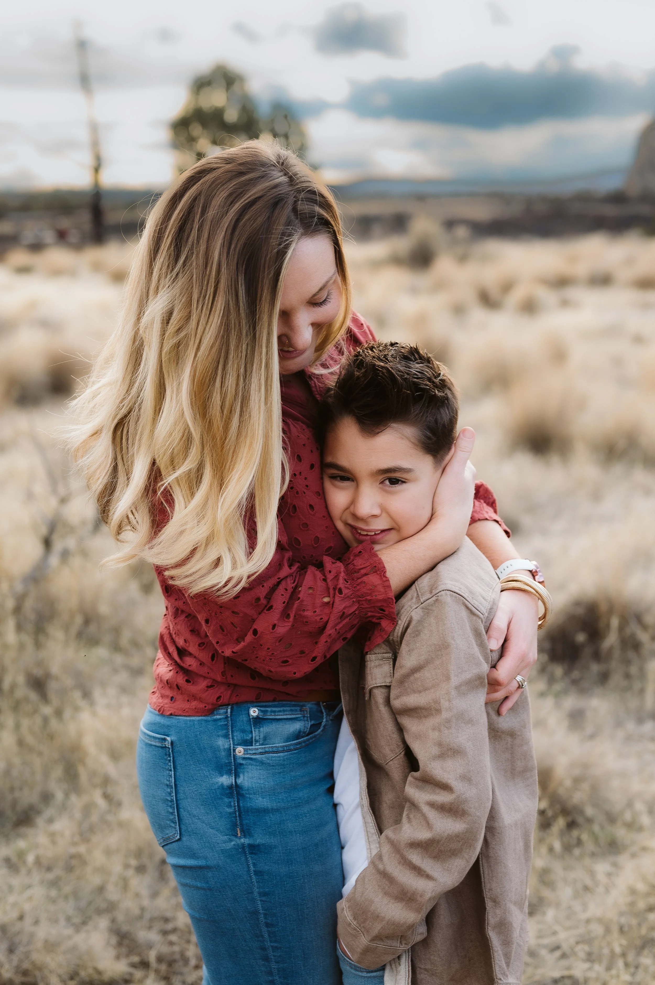 Mother and son photography in the Pacific Northwest showcasing an emotional, close connection during an outdoor family session.