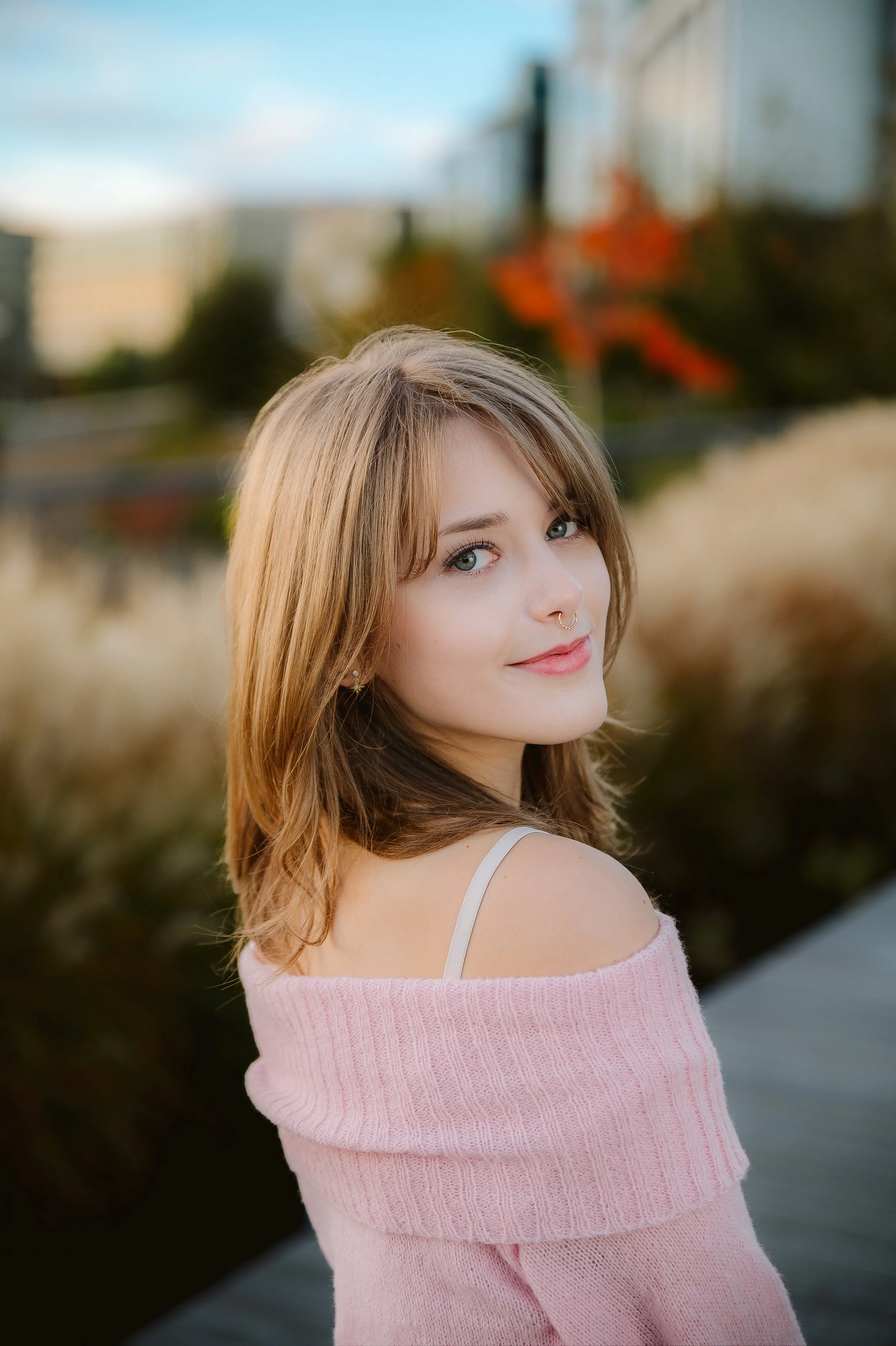 Senior photography session in Vancouver Washington capturing natural movement and seasonal tones in an outdoor setting.