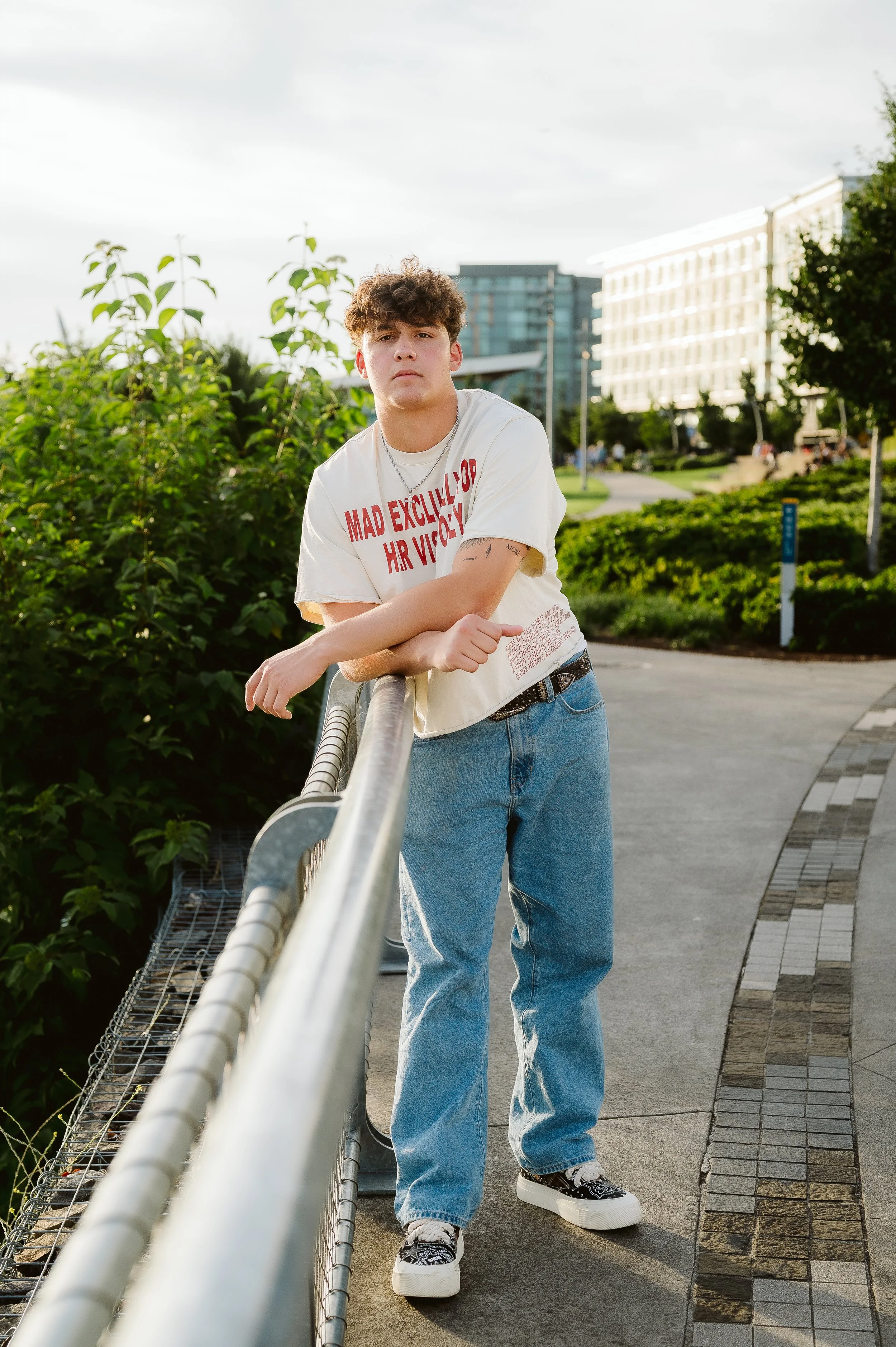 High school senior photography in Portland, Oregon featuring modern urban portraits with relaxed, confident posing.
