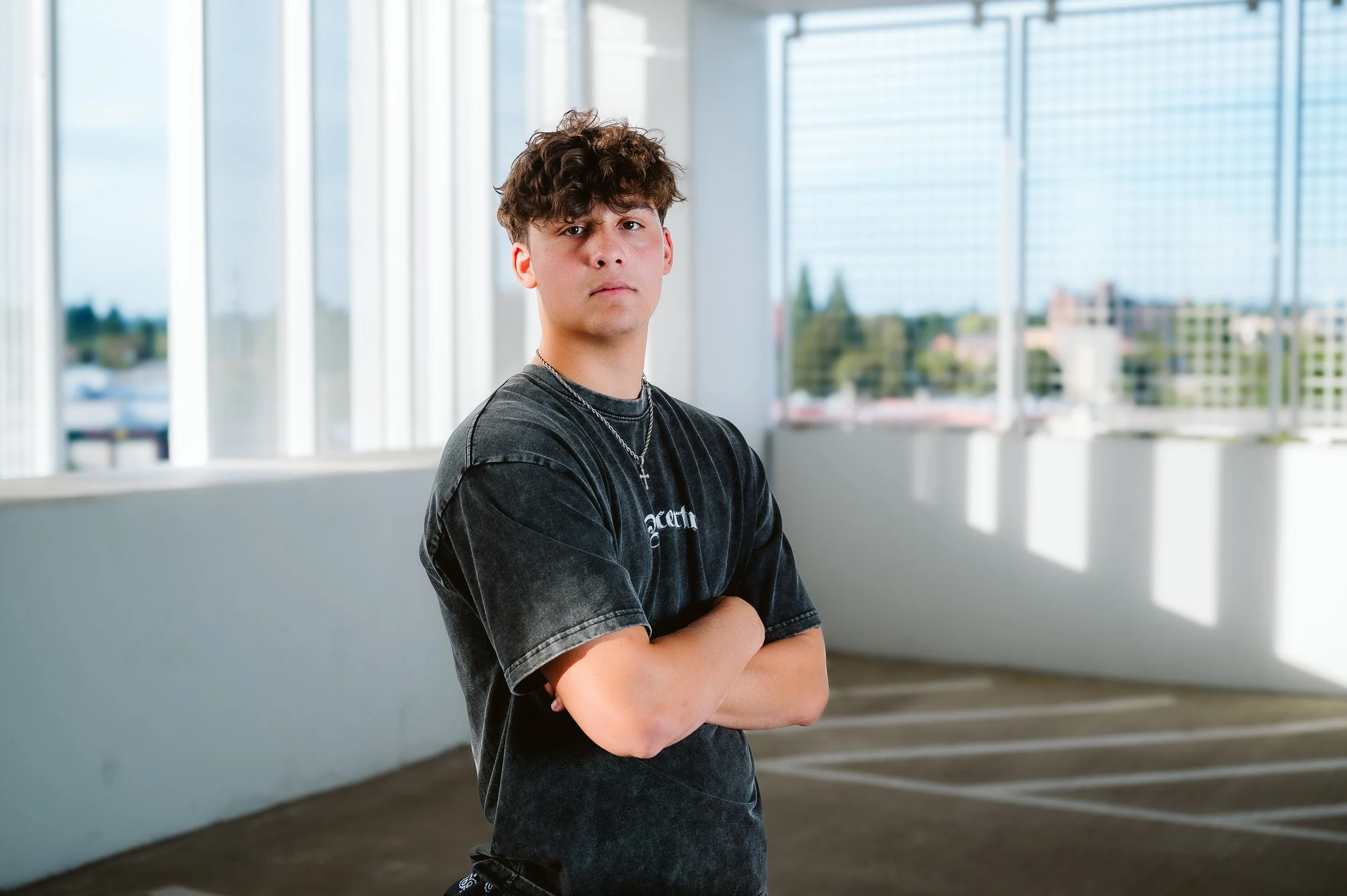 Modern senior portrait session photographed in Vancouver Washington using clean lines and bright natural light in an urban setting.