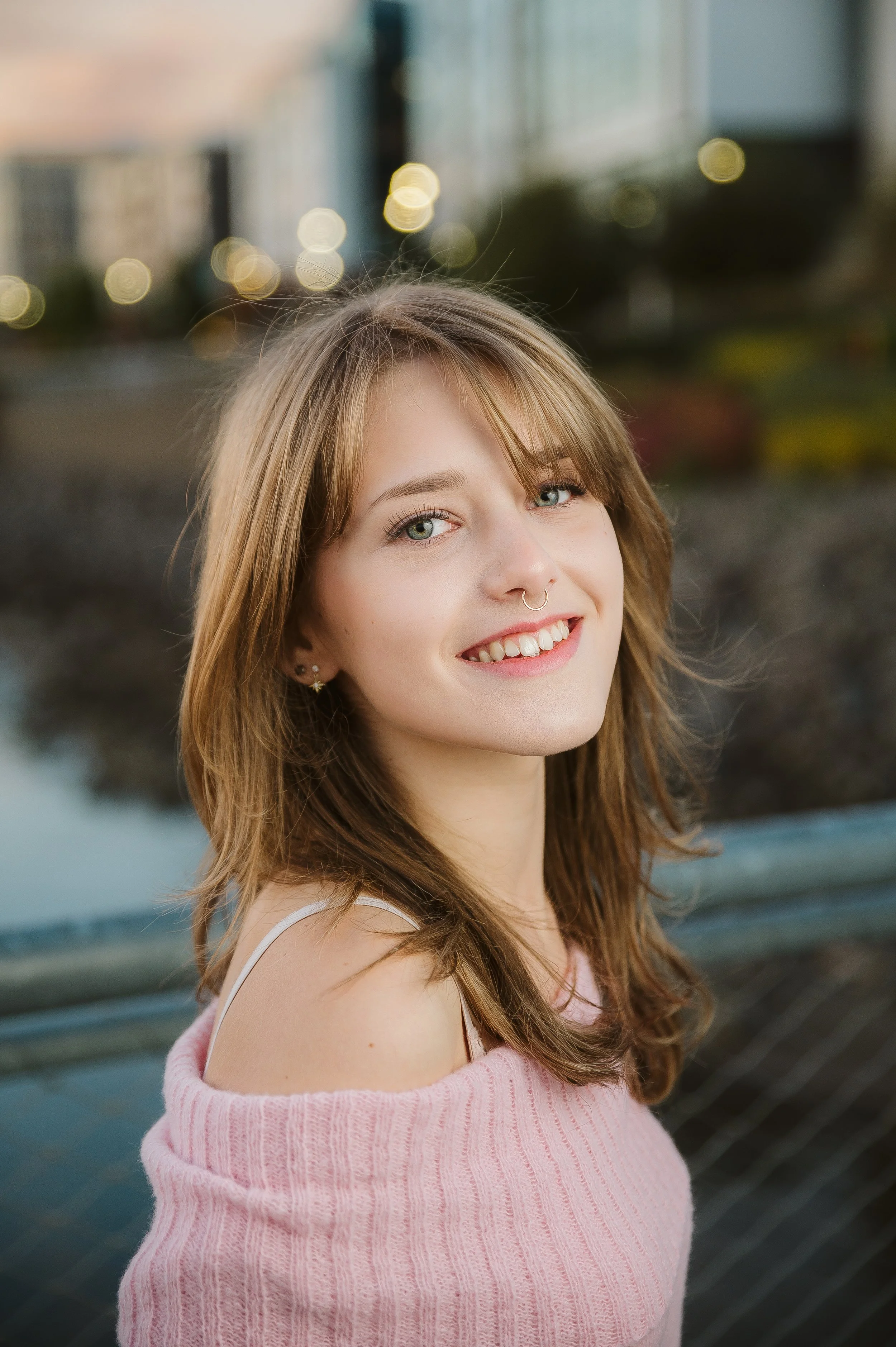 Natural light senior portrait taken in Vancouver Washington, highlighting soft tones and a calm, confident expression.