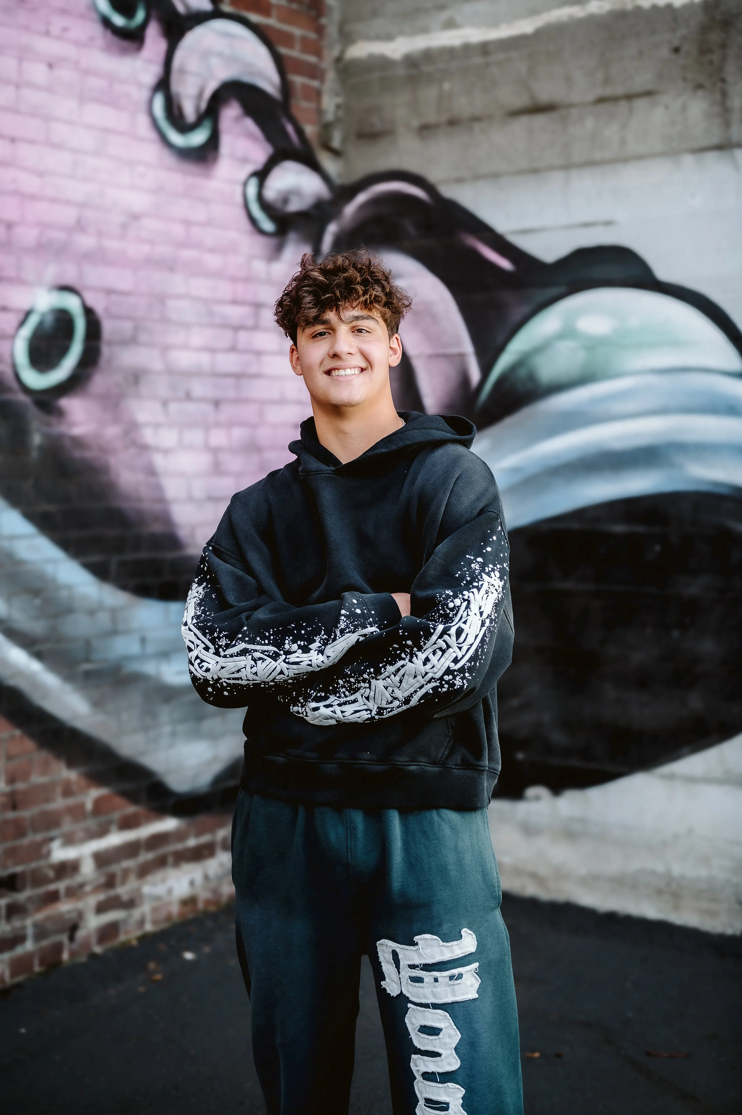 Urban senior portrait photography in Portland, Oregon featuring artistic backgrounds and street-style portraits.