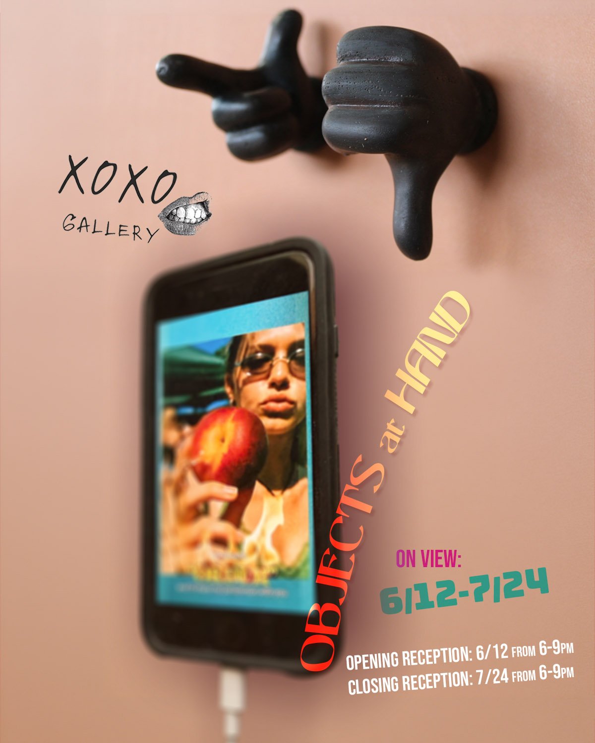 Flyer for Objects at Hand at XOXO Gallery — a phone mounted on a wall plays a video, with two sculptural black cartoon hands mounted above it.