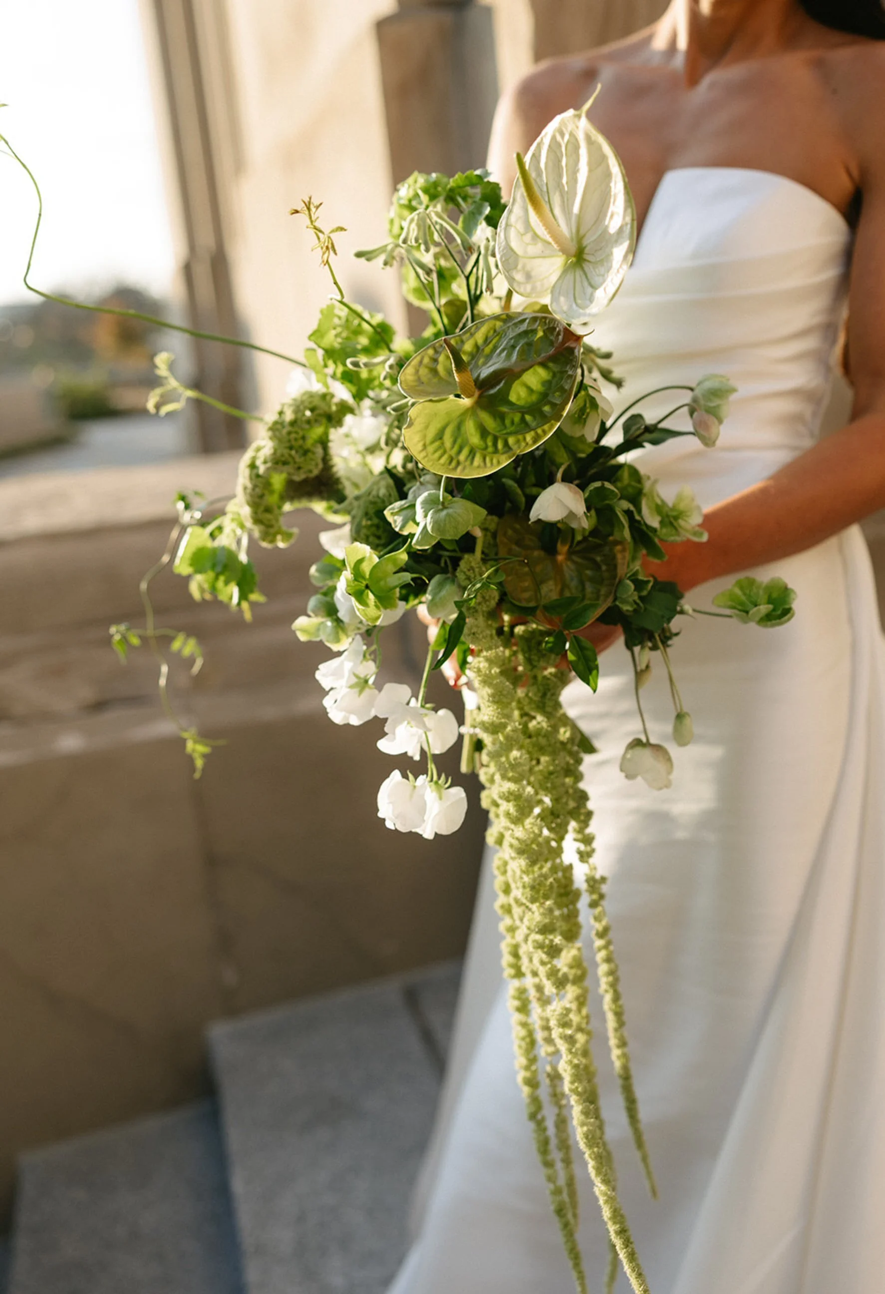 close up view of organic and white and green bridal bouquet