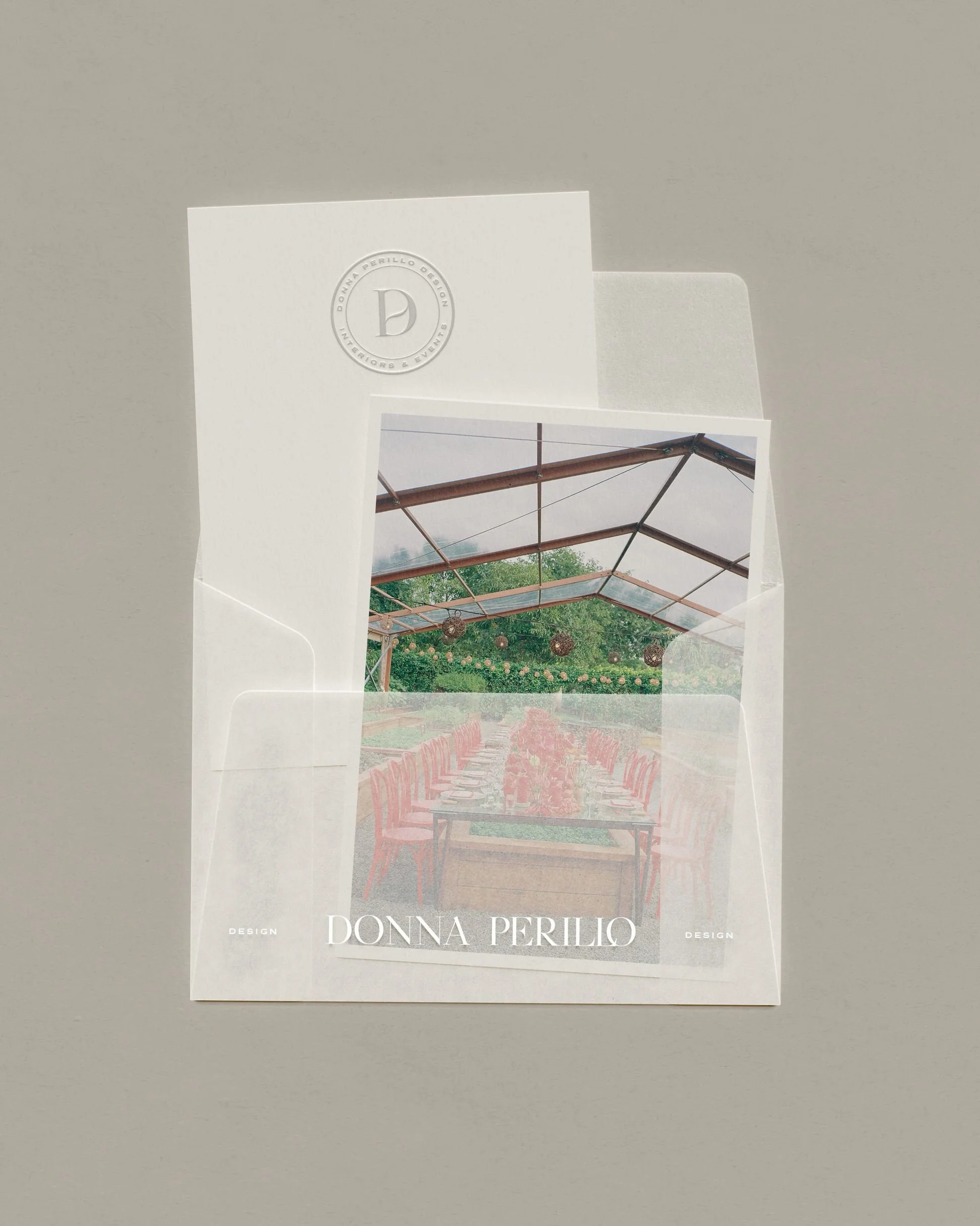 opaque envelope with branded note card and embossed detail