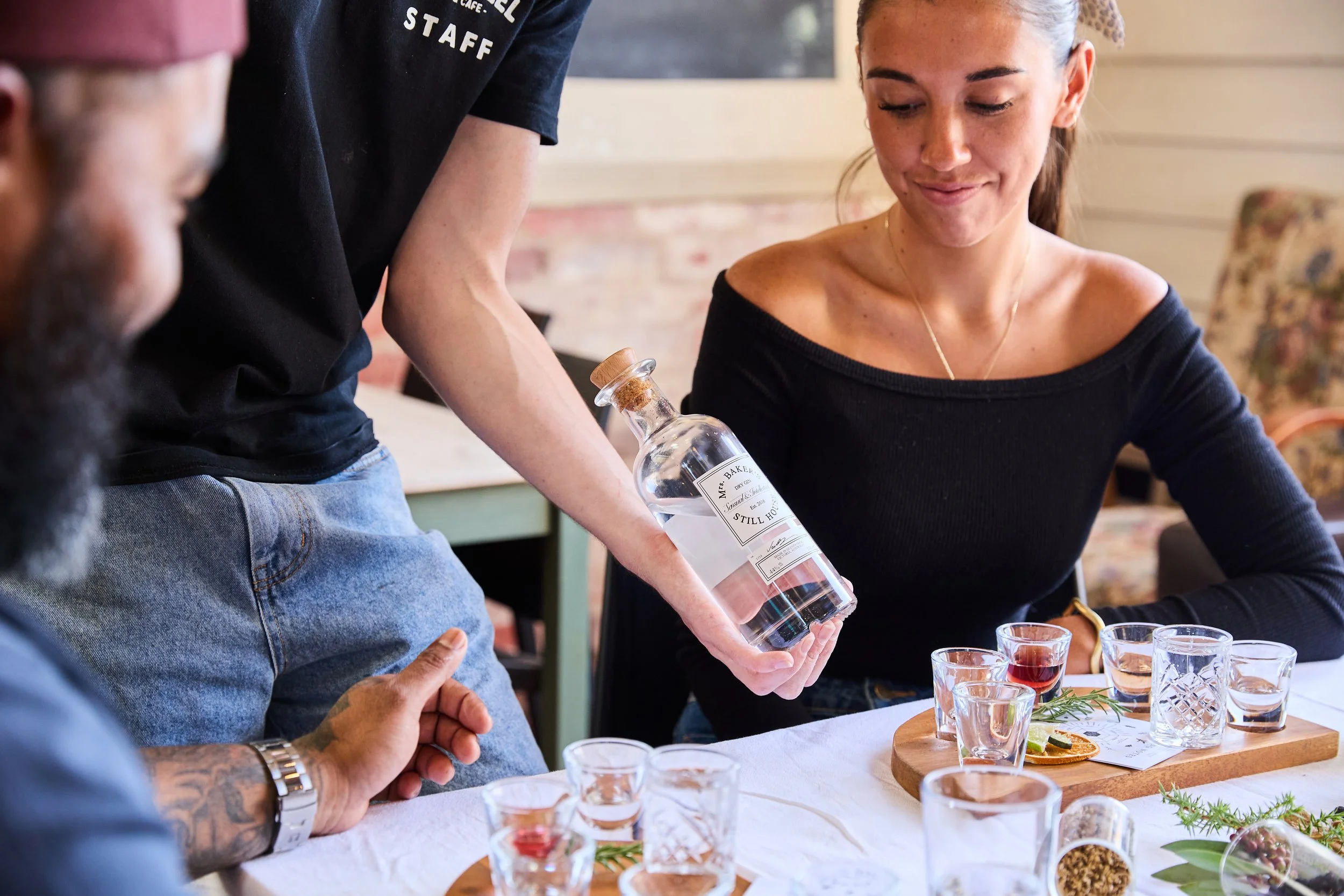 FlyWheel Anjal_woman tasting.jpeg