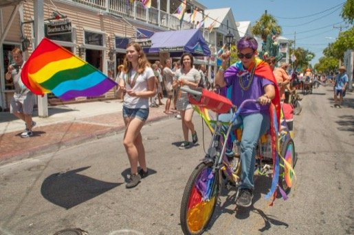 The KWHS GSA Parades down Duval Street on their pride-themed art bike. 