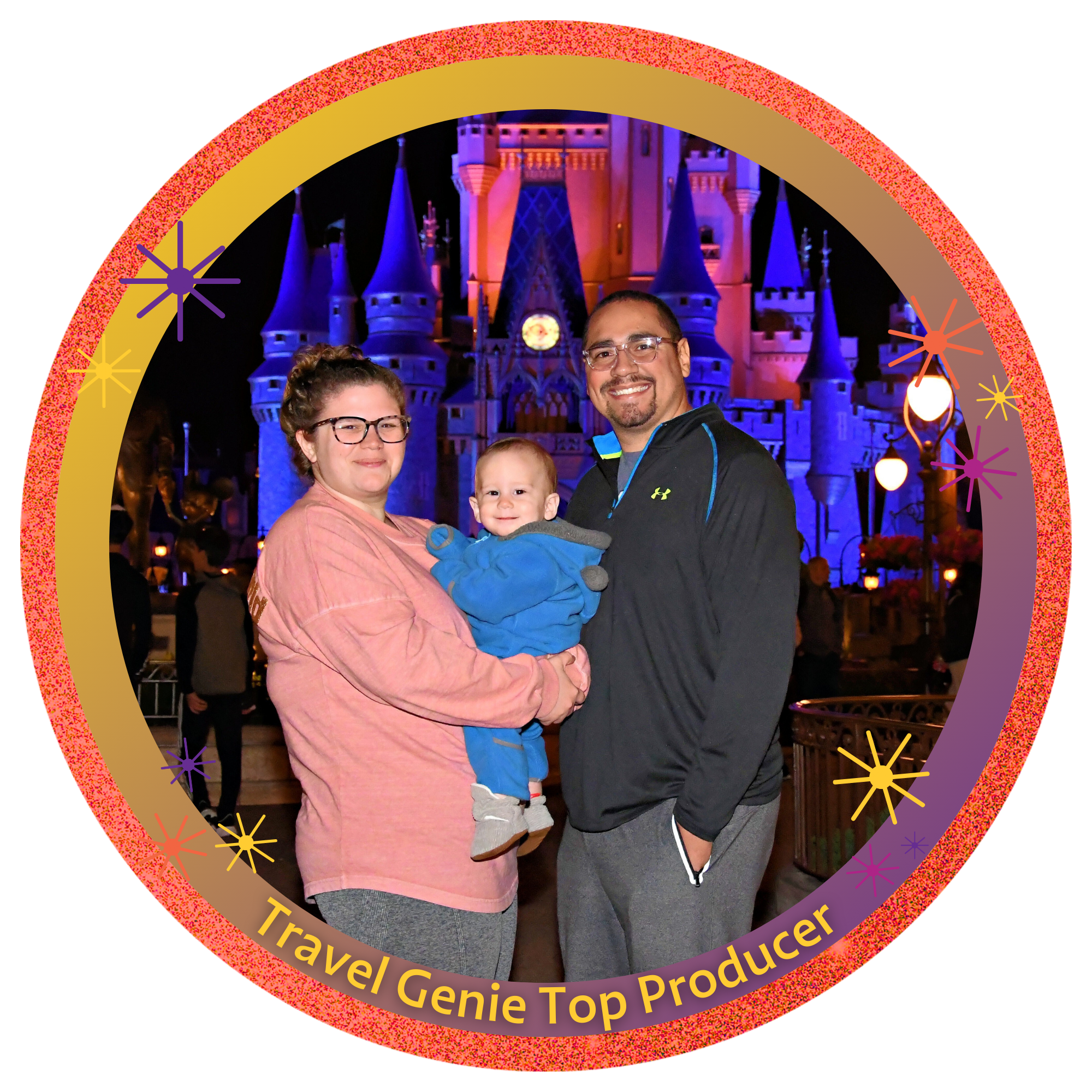 A family of three standing in front of Cinderella's Castle at night at Disney World, with the mother holding a smiling young child and the father standing beside them, all smiling.