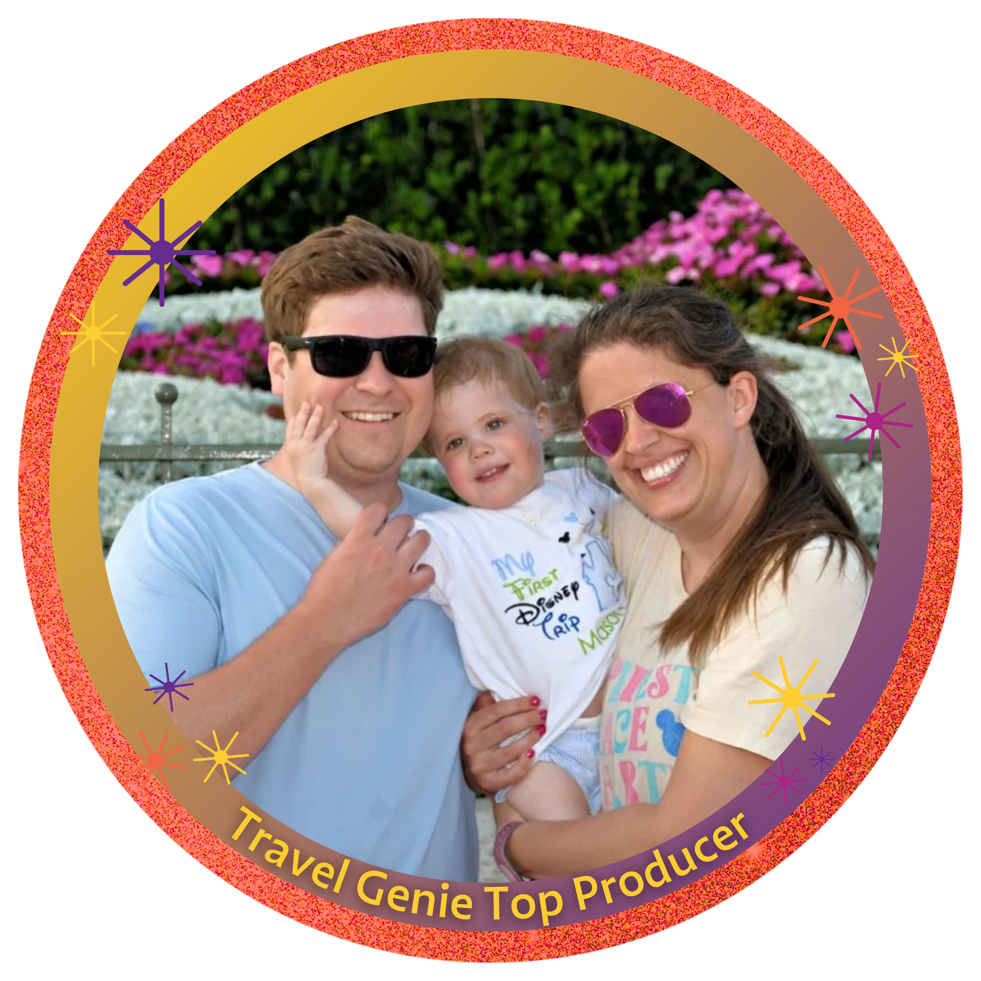 A smiling family of three, a man, woman, and young girl, posing outdoors in front of colorful flowers. All are wearing sunglasses and smiling at the camera.