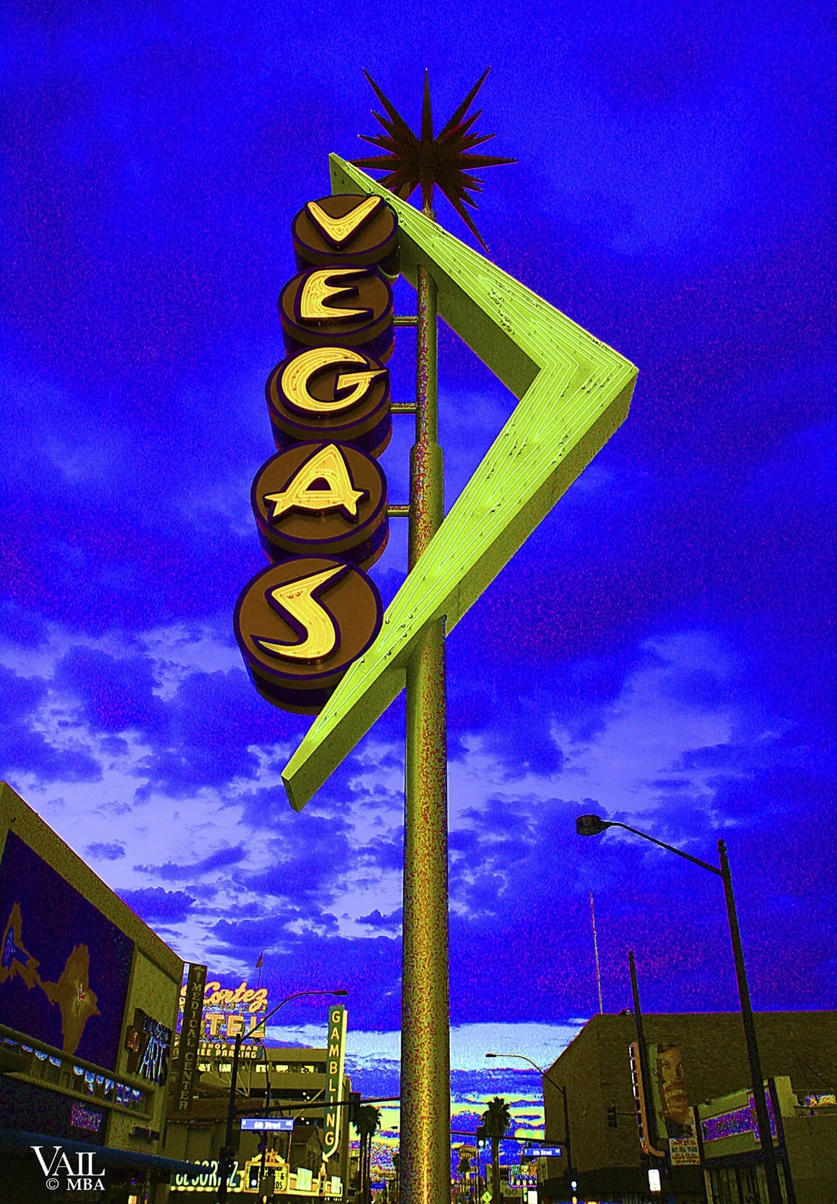 Night shot of Vegas neon sign on Fremont Street. 