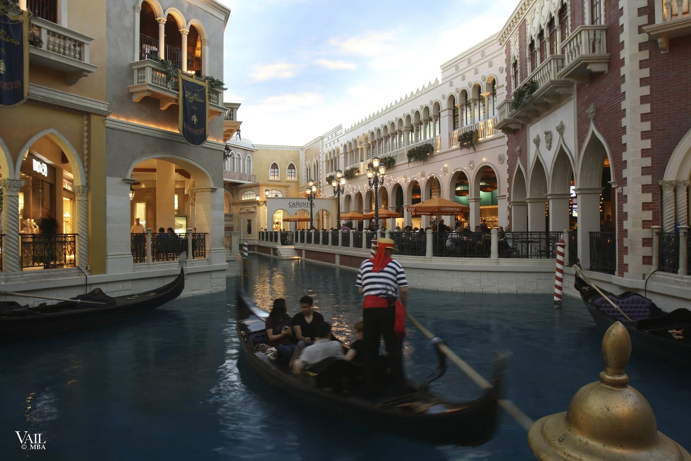 Venetian Hotel retail interior with Gondolas floating in a canal.