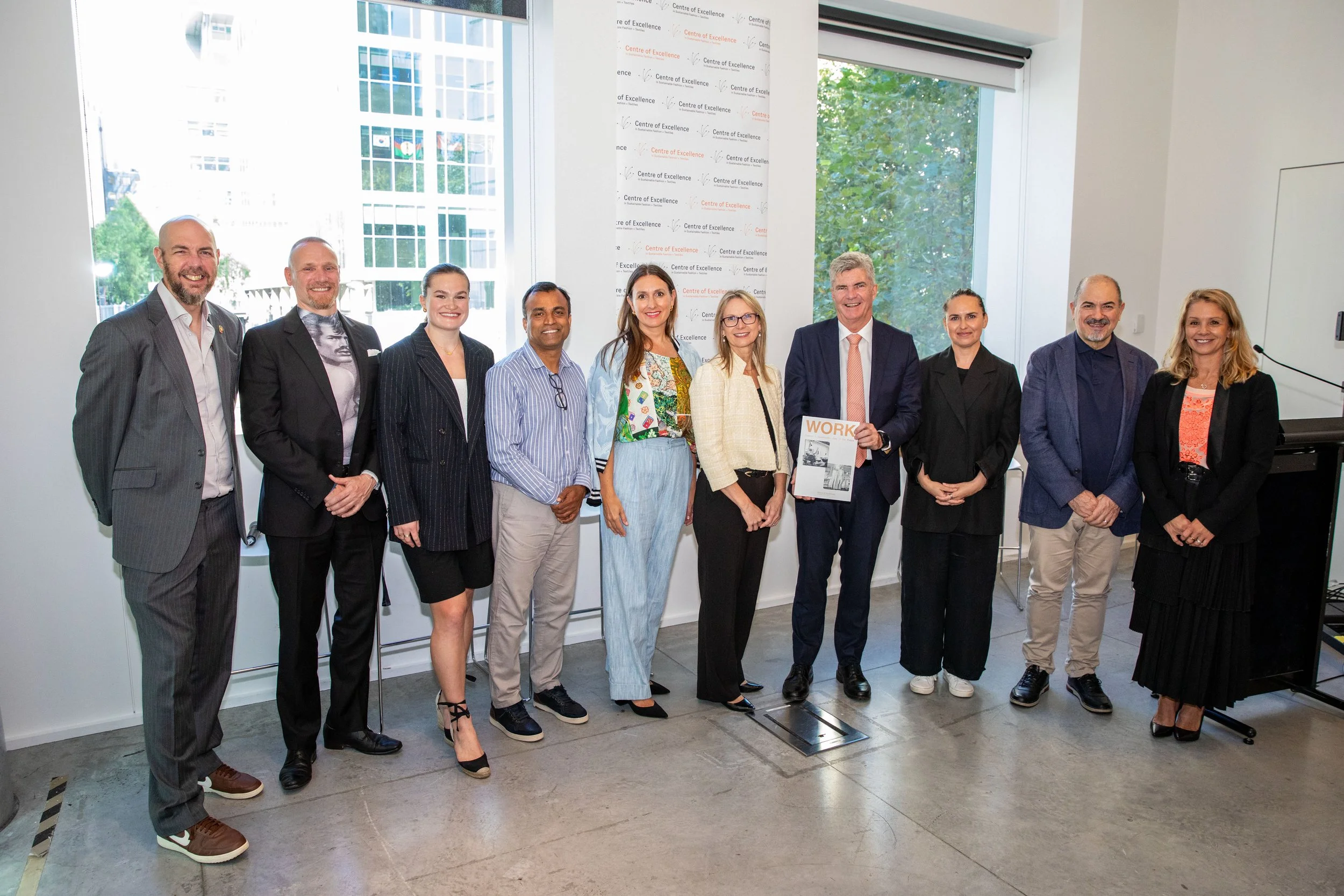 Photo of research team and panel speakers