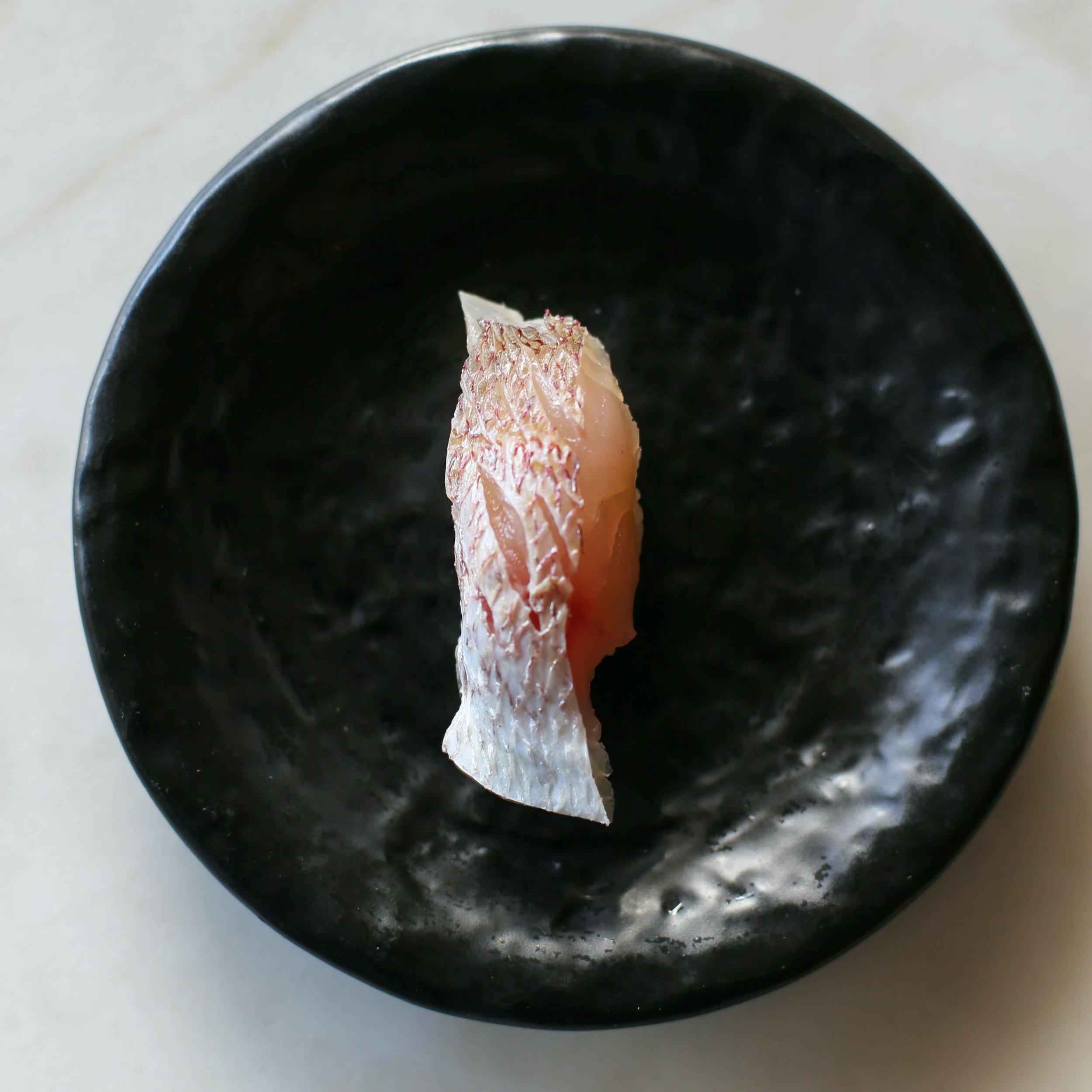 Kasugo-Dai | Baby Snapper 
When a snapper is around one year old, it is called Kasugo&mdash;&ldquo;child of spring.&rdquo; And spring is when baby snapper comes into season! Lean, complex, and slightly sweet. Get it while it lasts 🍣