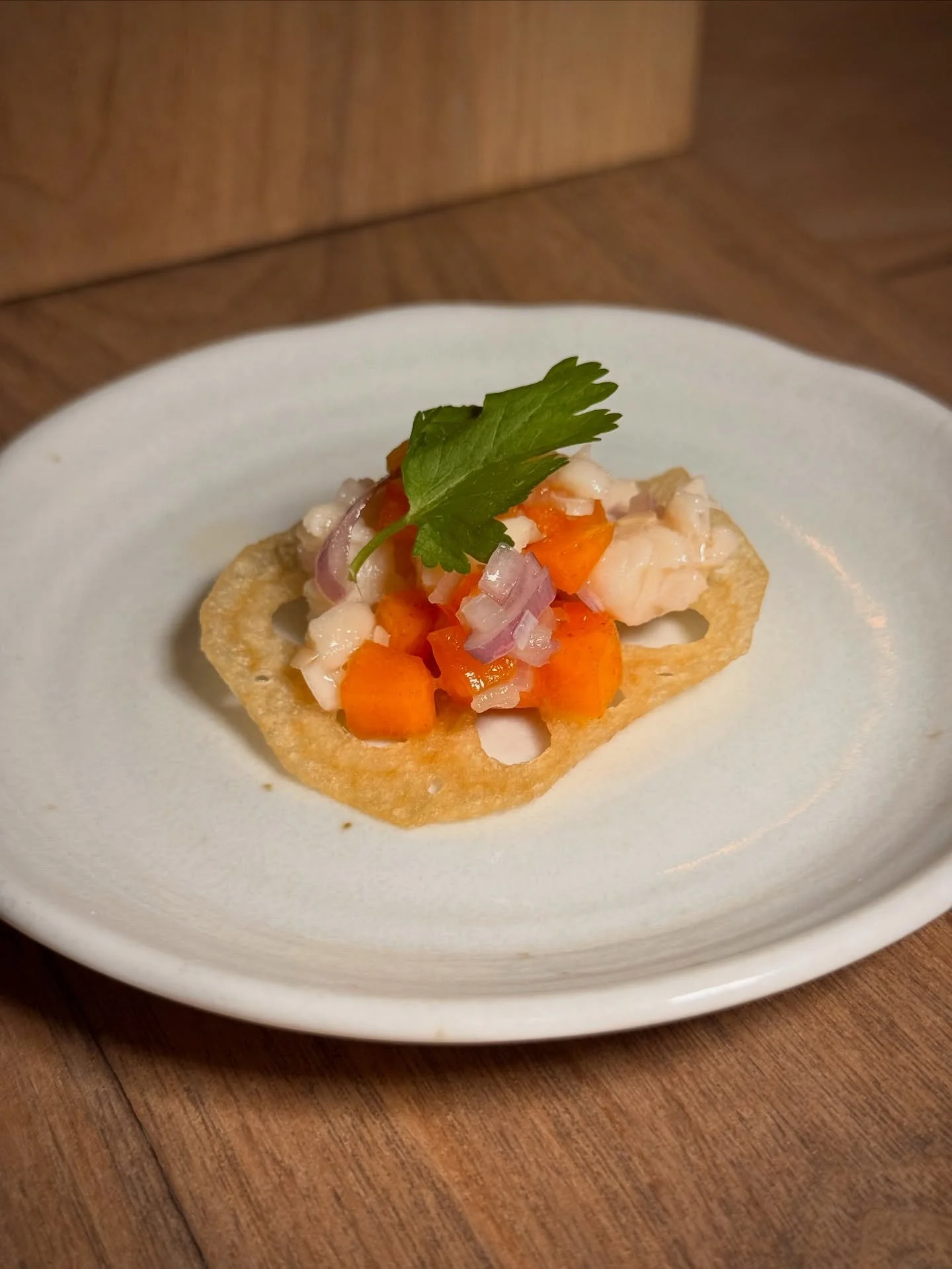 Introducing our latest and greatest appetizer, Salmon tartare! Salmon, persimmon, and shallot on a fried lotus root chip 🤩
Truly one of our best creations :)

#appetizer #salmon #persimmon #venturablvd #foodie