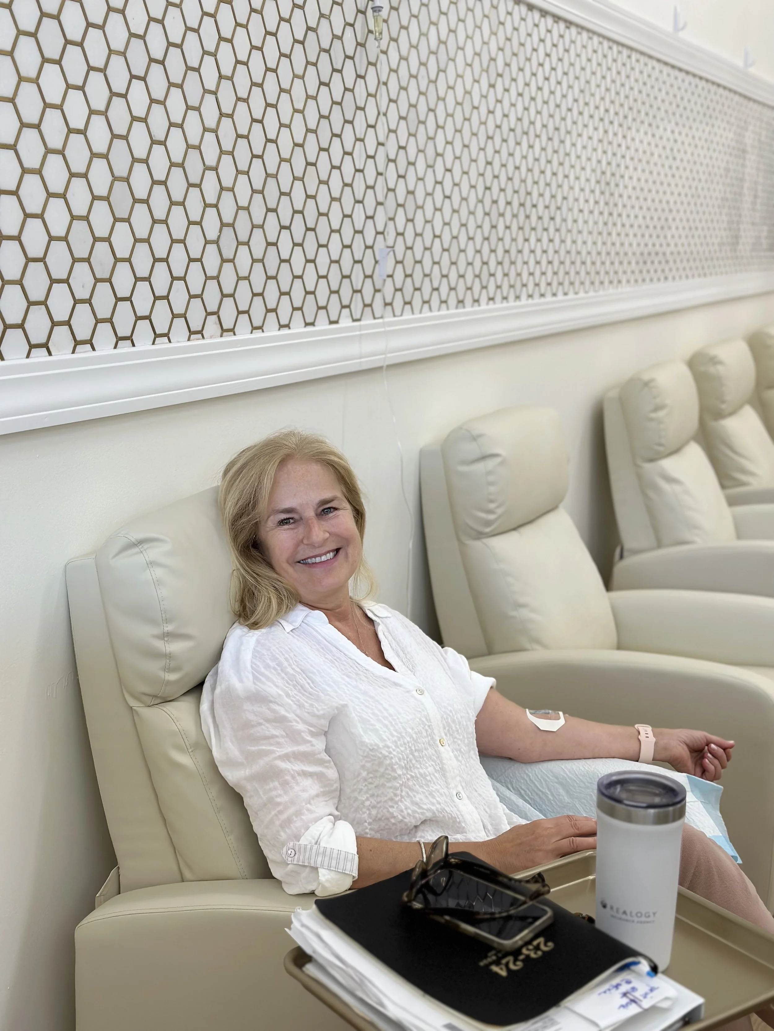 Patient receiving IV drip therapy at Golden Aesthetics in Newtown, CT for hydration and vitamin replenishment