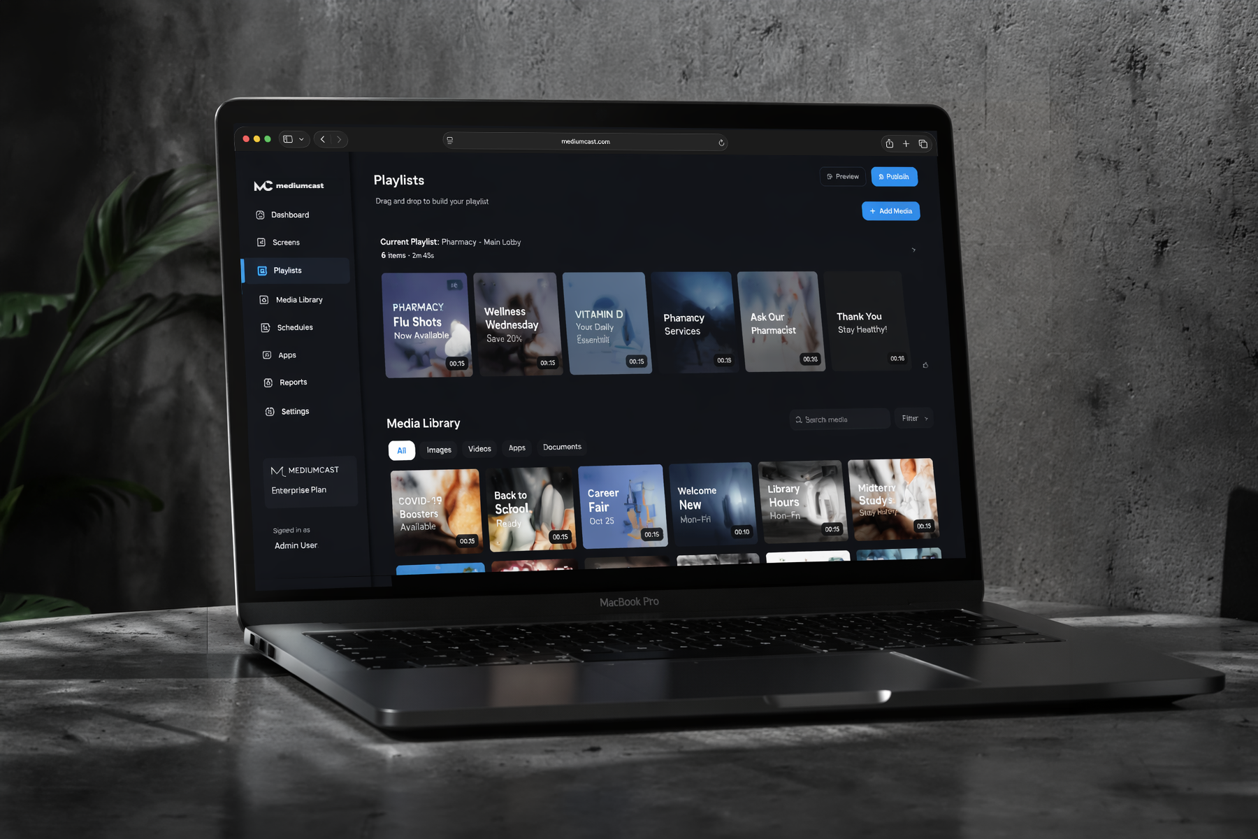 an image of a laptop displaying a mockup of the Mediumcast desktop dashboard