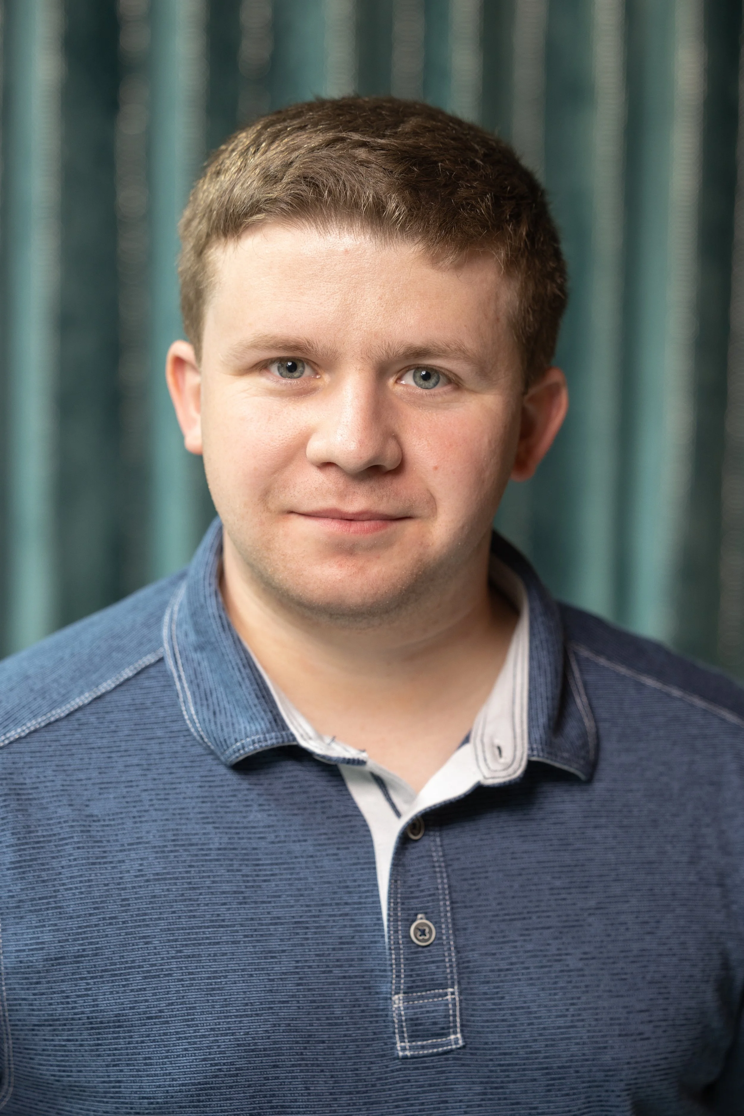 2024 Headshot #1 SMALLER - A.J. Moss.jpg