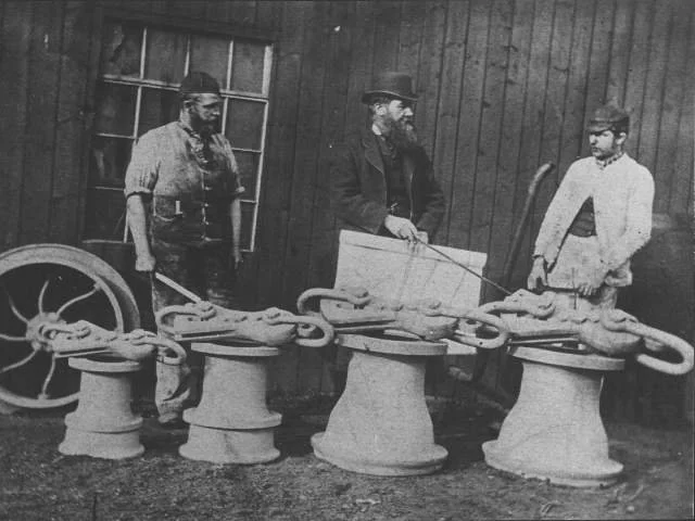 Early image of engineering discussion regarding mine safety manufacturing