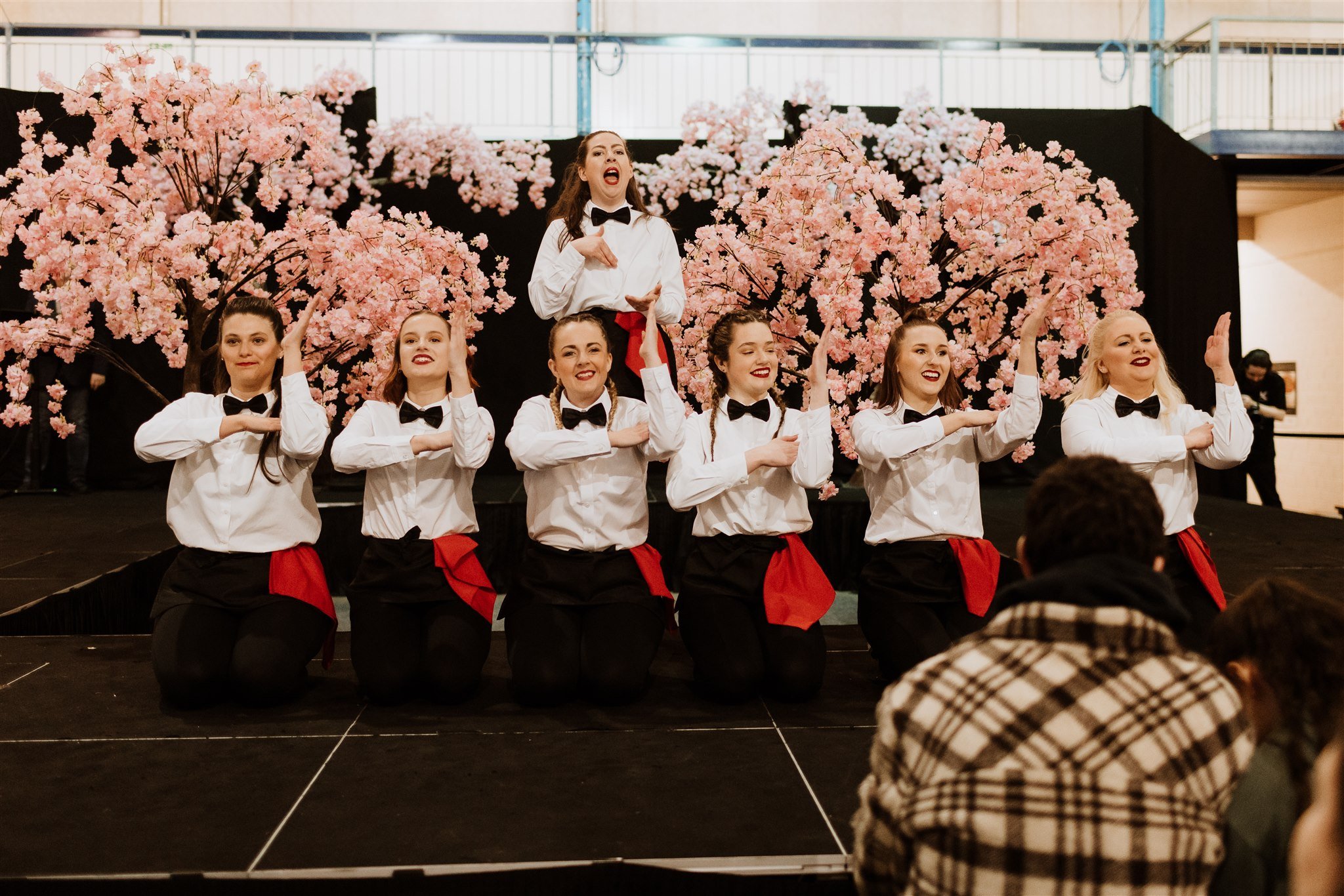 The Dancing Waiters performing on stage before the catwalk show at The Big Southwest Wedding Fair