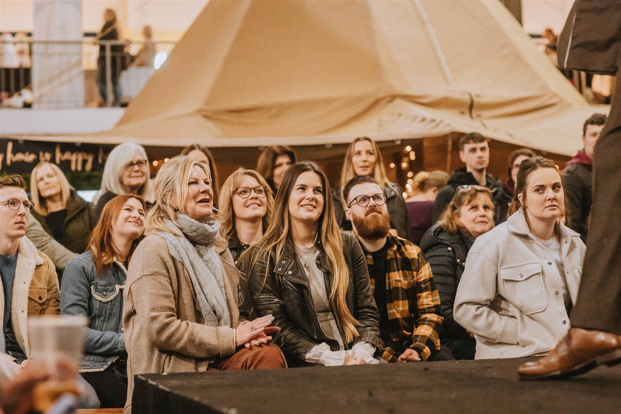 Smiling faces watching The popular bridal, menswear, bridesmaid and mother of the bride/groom catwalk shows at The Big Southwest Wedding Fair