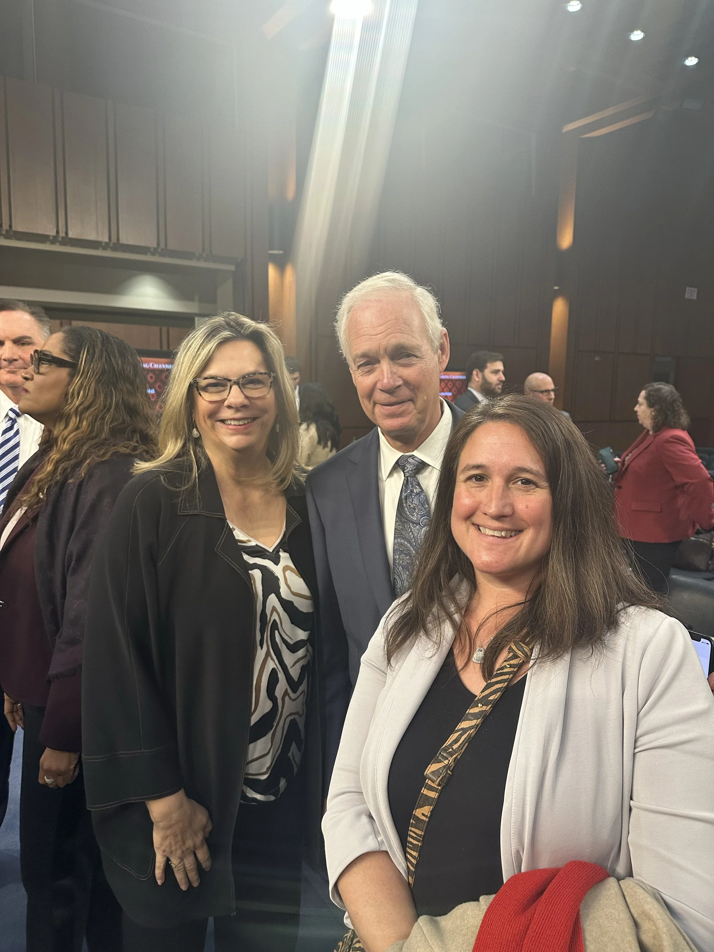 Jenn McNary and fellow advocate Mindy Cameron with Senator Ron Johnson after a briefing on rare disease with the FDA, fall 2025.