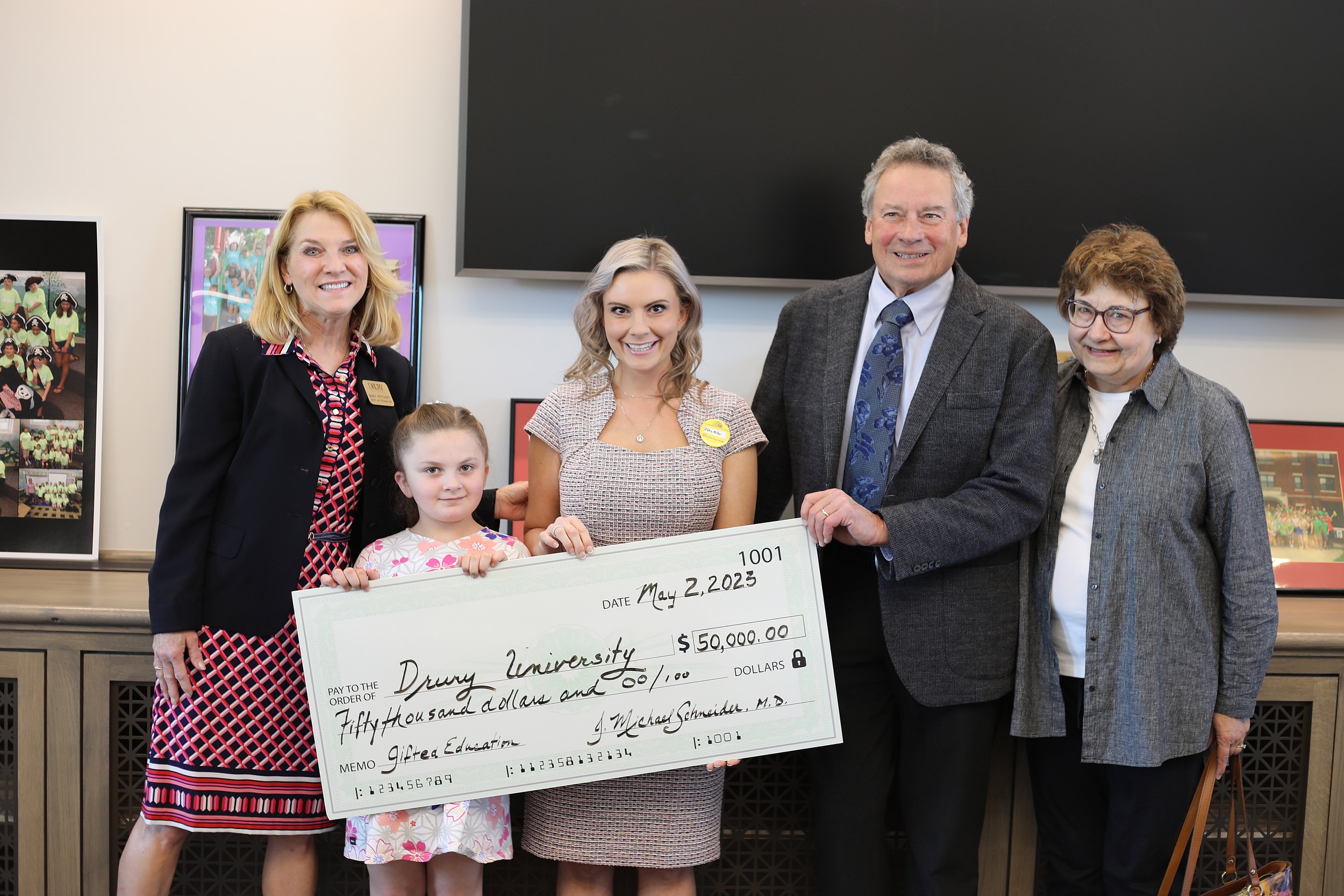 2023 Check Presentation with Drury University for the Center for Gifted Education Summerscape.