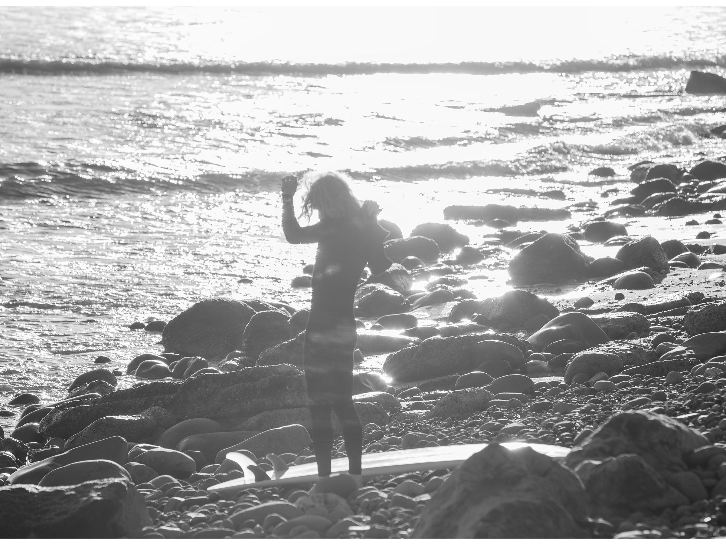 haze-break-surfer-morning-light-photograph.jpg