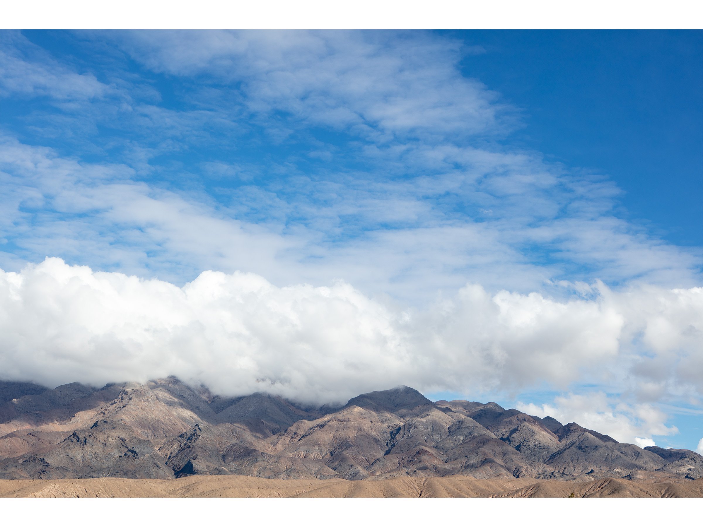 through-the-door-clouds-desert-art-print.jpg