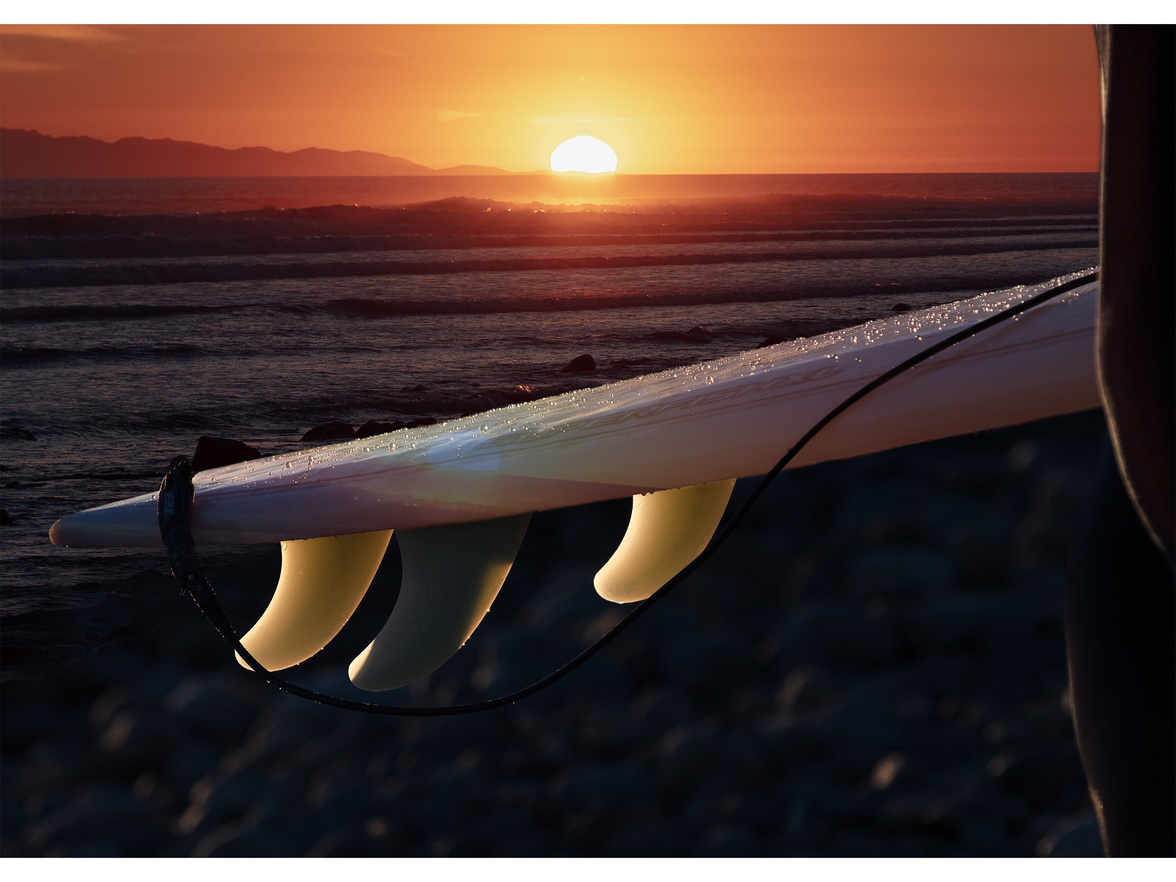 surfer-sunset-surfboard-dusk-photograph.jpg