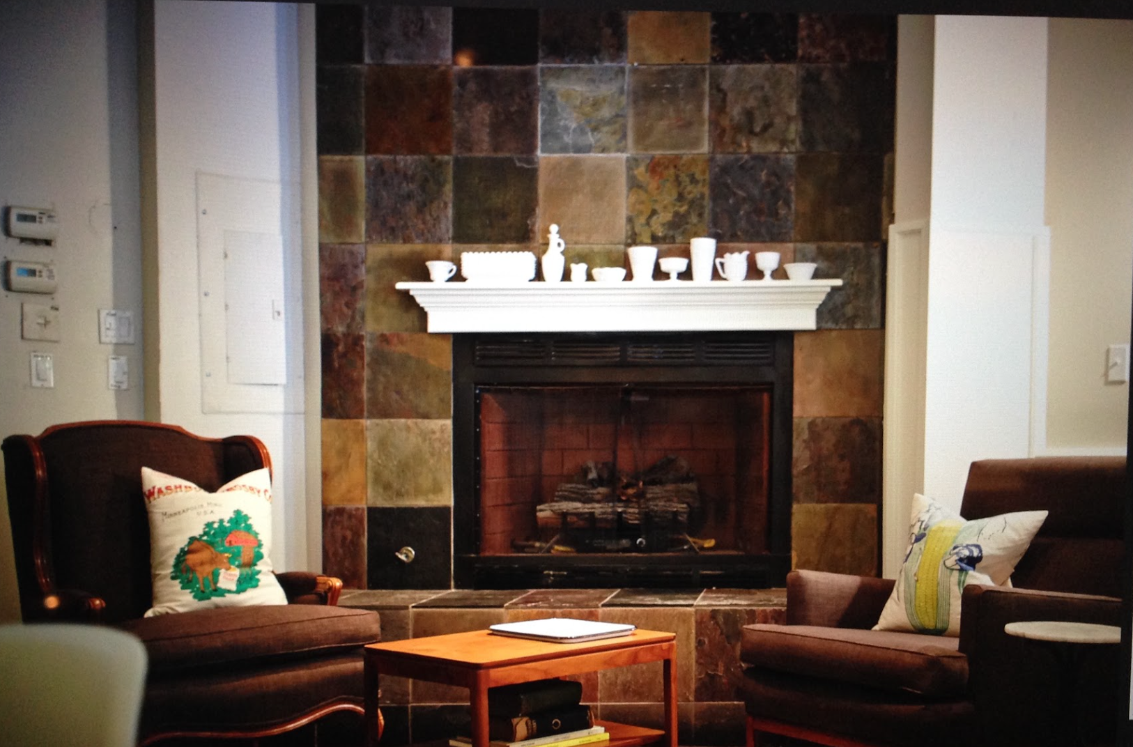 Floor-to-Ceiling Stone Fireplace With Built-Ins That Fit the Room