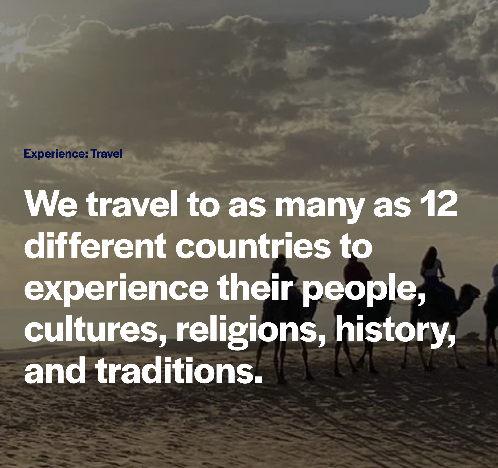 Silhouettes of people riding camels on a desert at sunset with a partly cloudy sky.