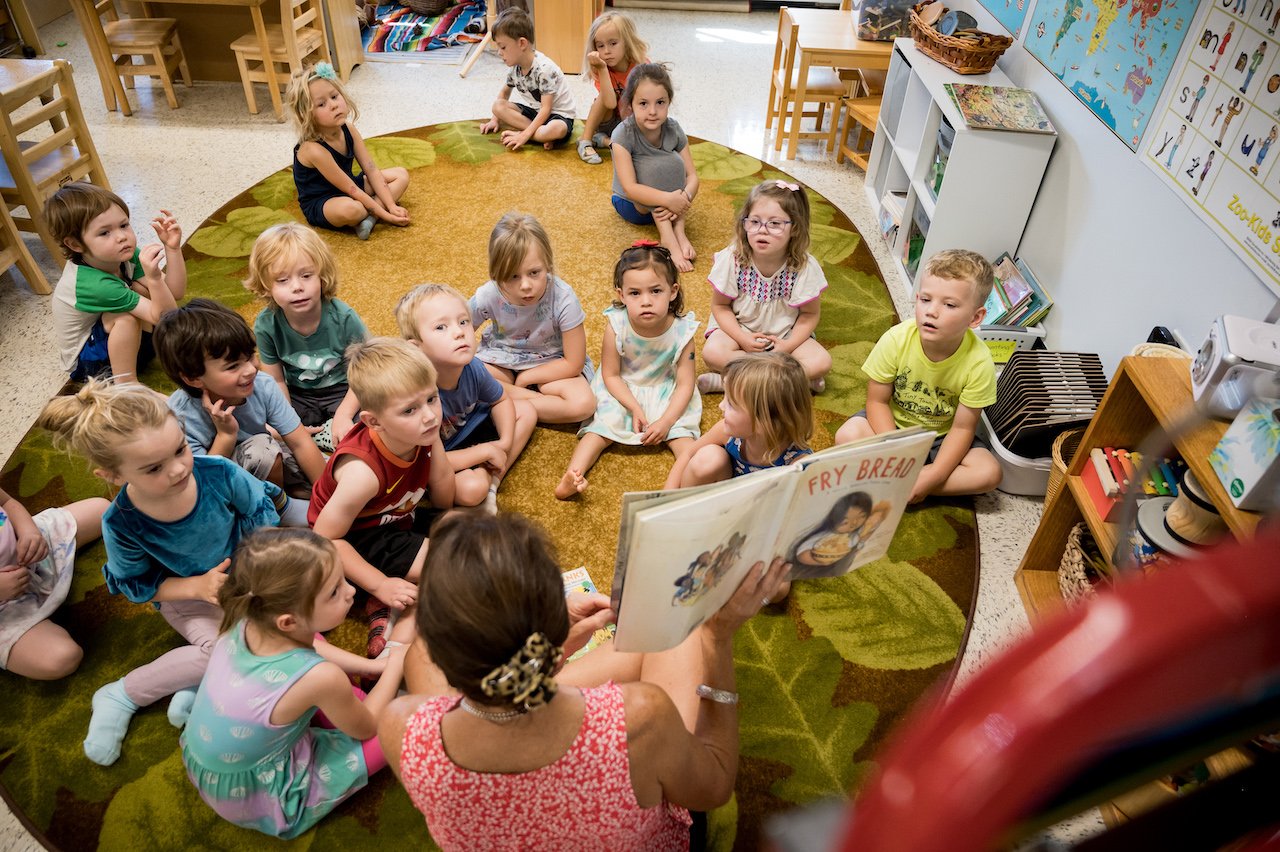 preschool_teacher_reading_to_class.jpg