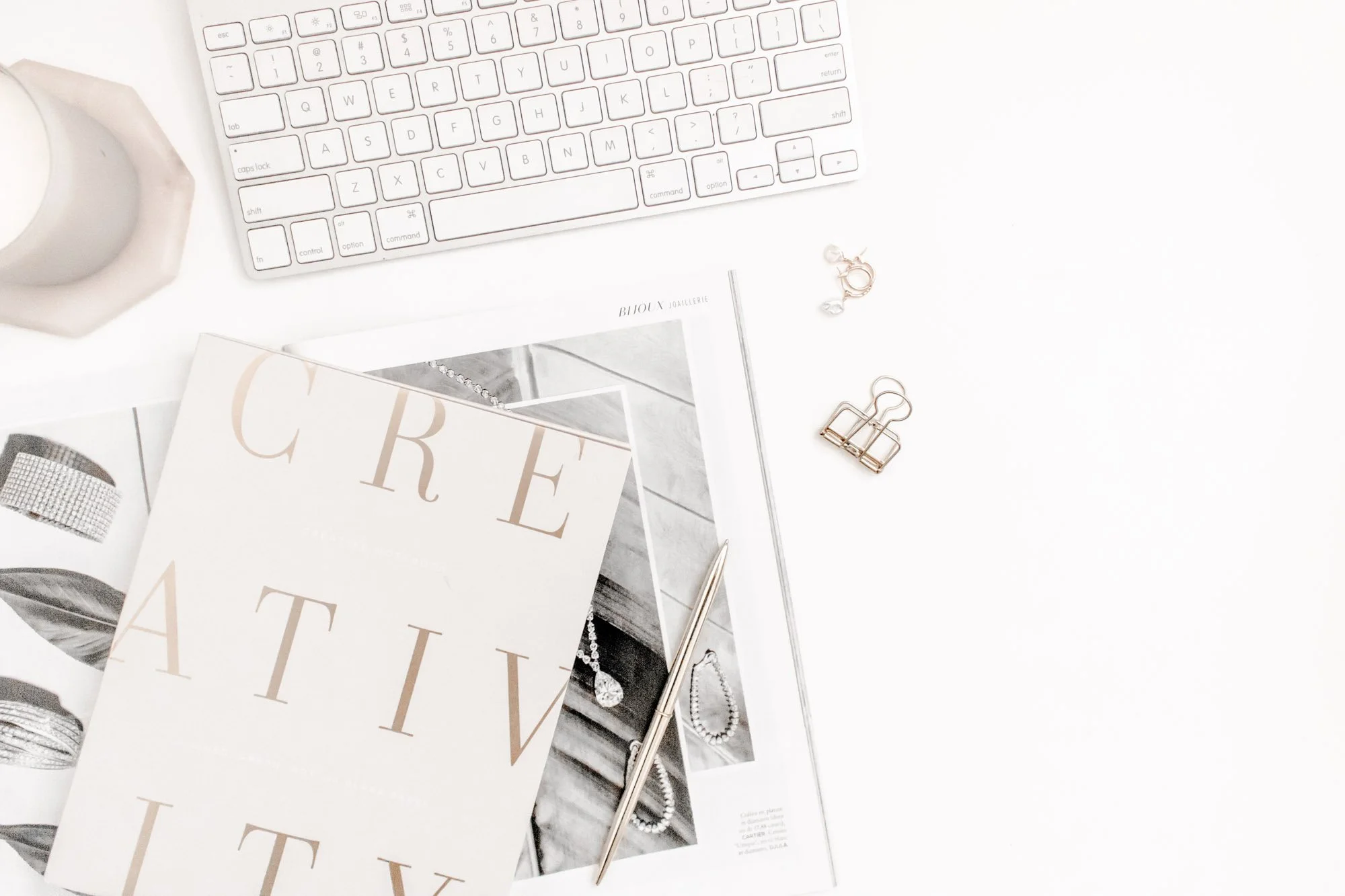 Light and airy desktop with creative notebook, soft brown overlay.