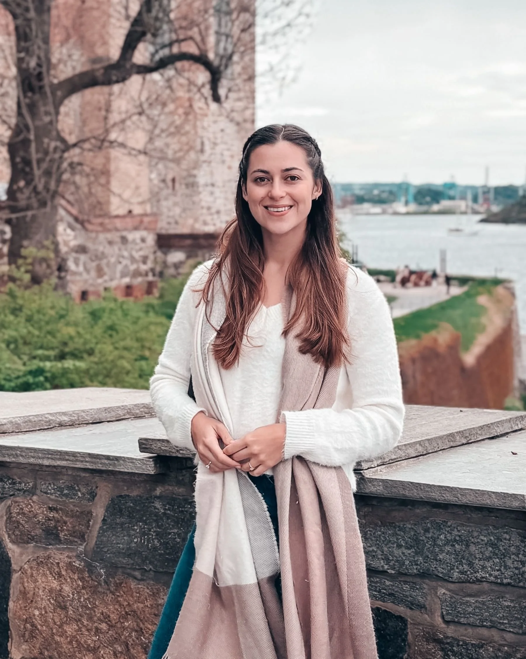 Polished woman smiling at camera. The designer.