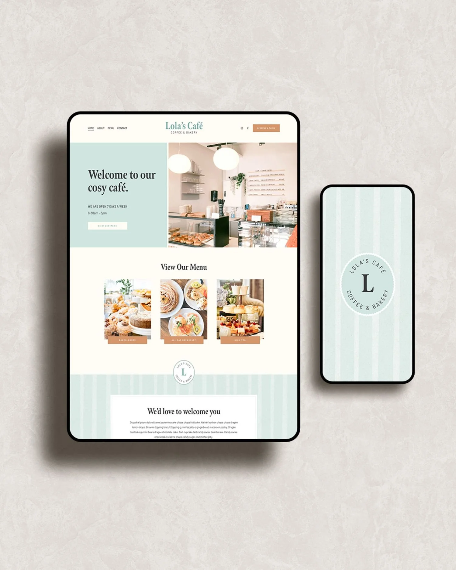Clean, cosy cafe website mocked up in modern tablet, brand submark mocked up in modern mobile.