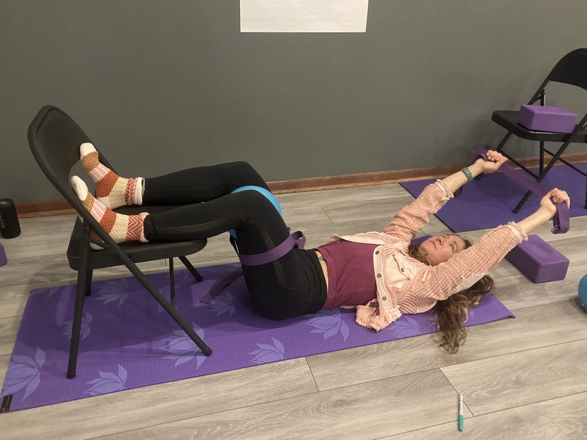 somatic yoga exercises with therapeutic yoga props