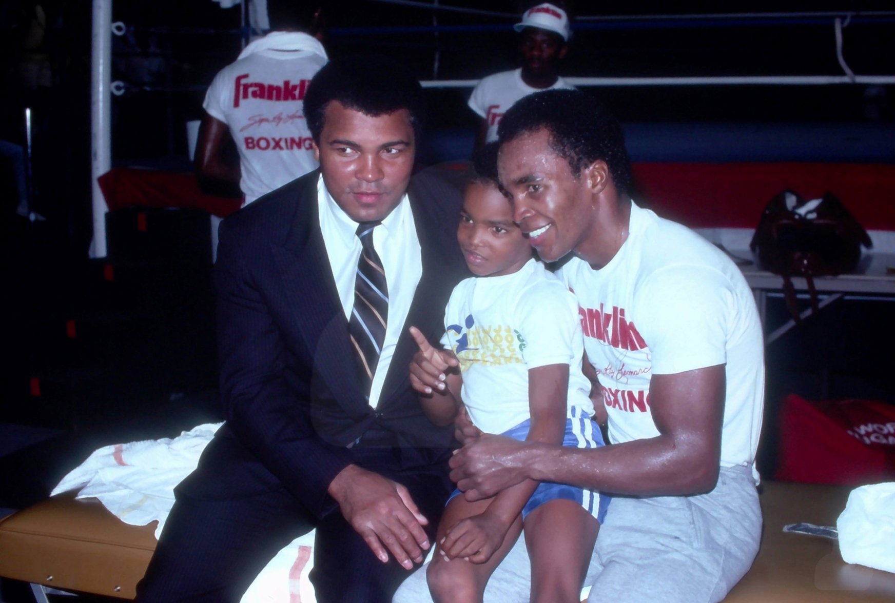 Muhammad Ali, Ray Leonard Jr. and Sugar Ray Leonard after Leonard's training session, Las Vegas, Nevada, September 1981.