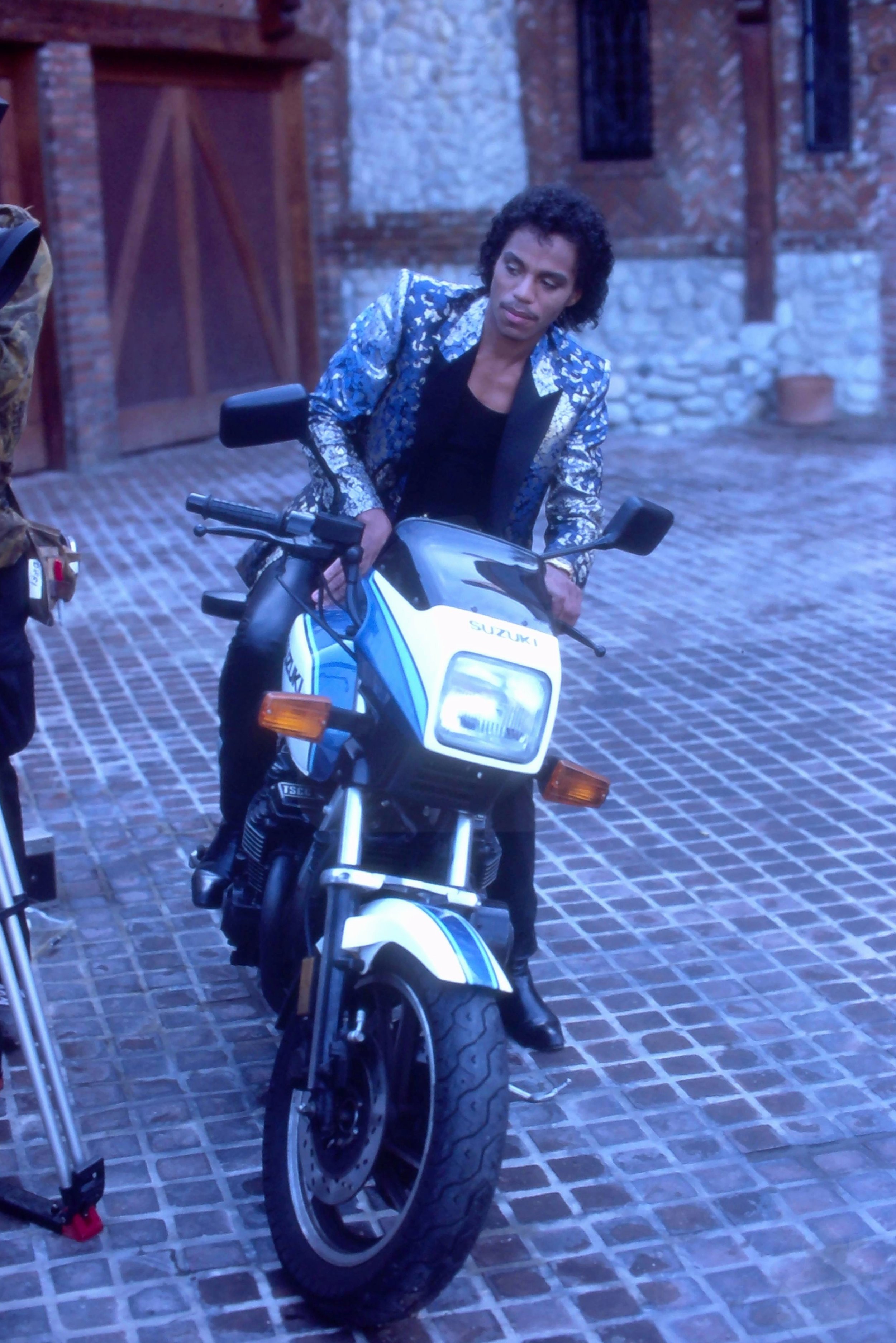 Marlon Jackson sits on the Motorcycle for the "Body" video. Los Angeles, CA, October 1984.