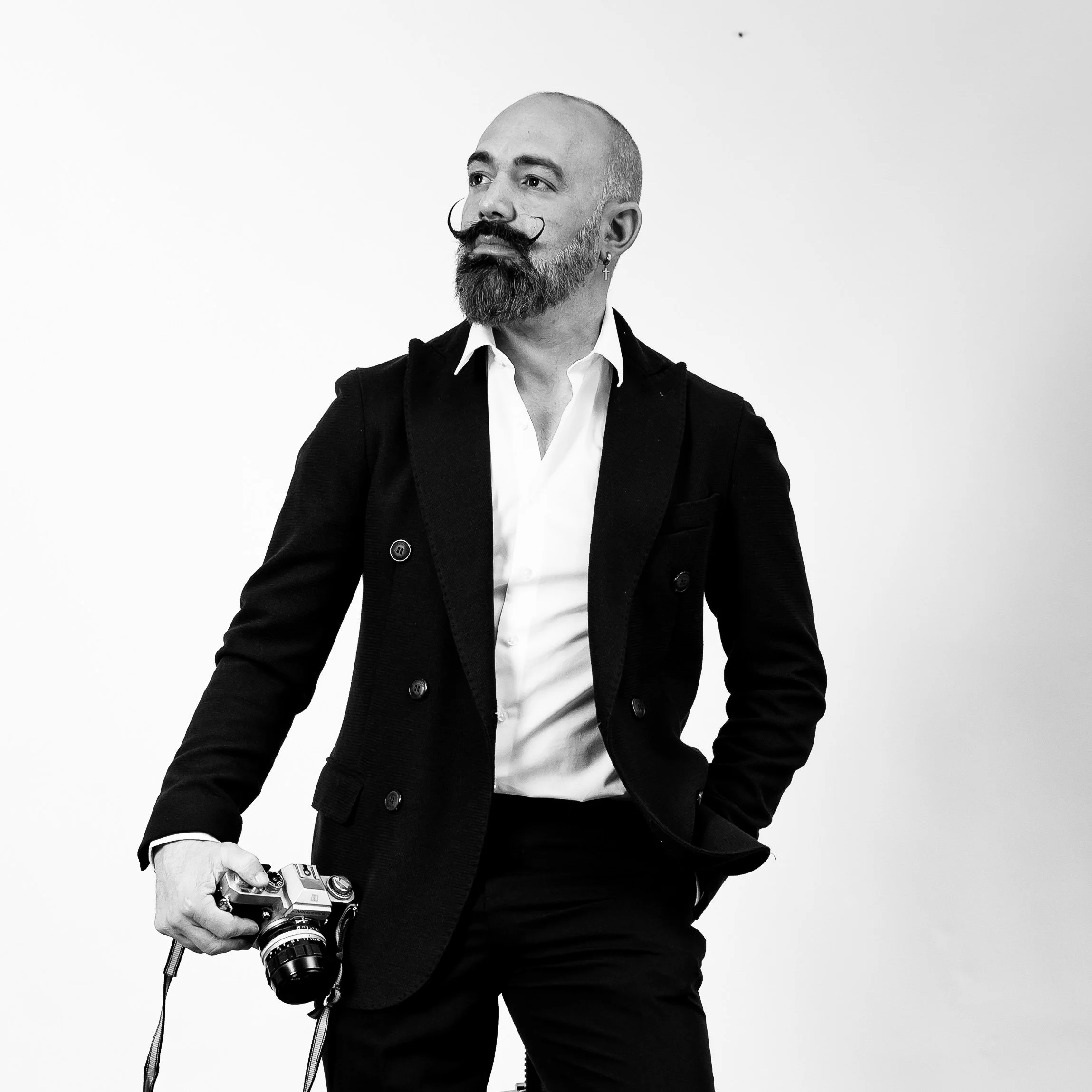 Giacomo Lai, founder of Giacomo Lai Wedding Studio, specializing in luxury destination wedding photography in Italy. Editorial and cinematic style for high-end international couples.