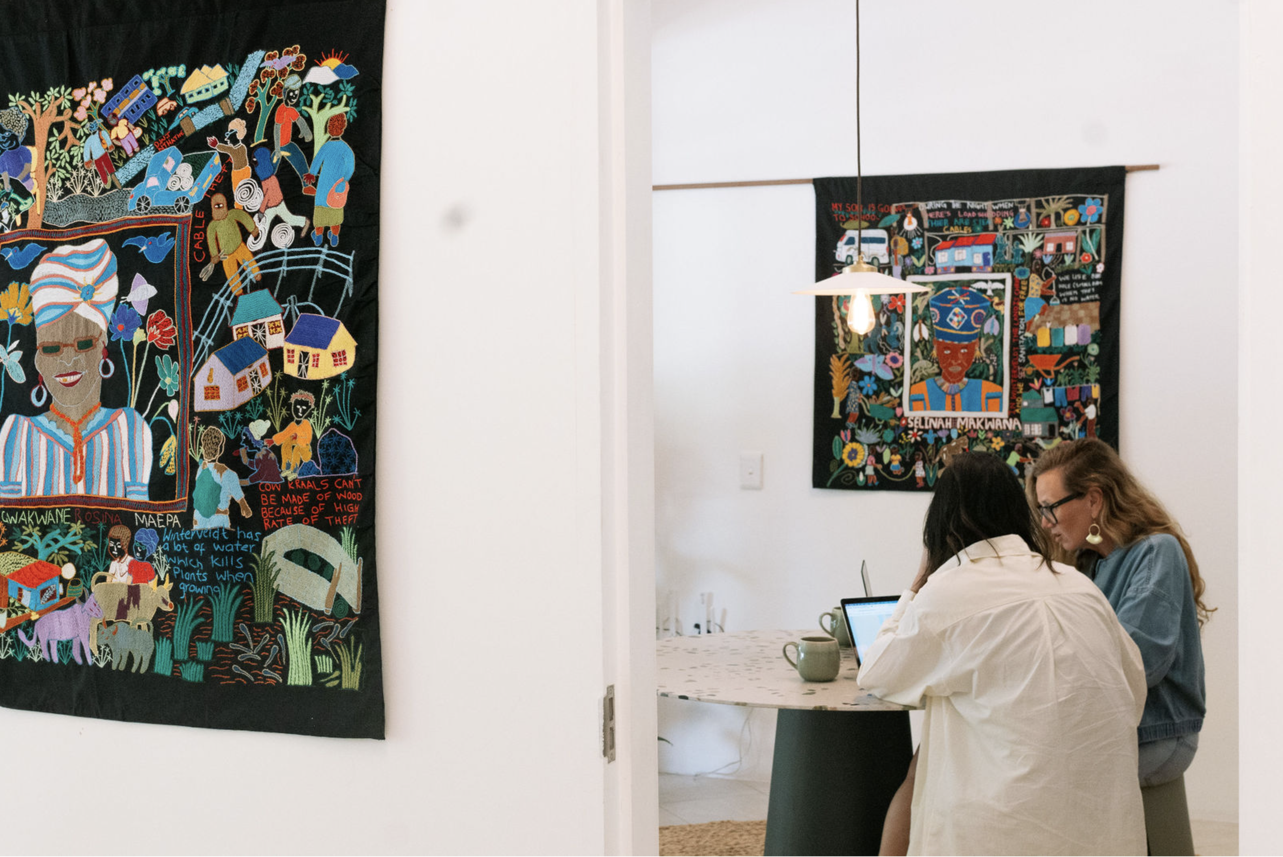 Liezel and Kitty working in gallery.png