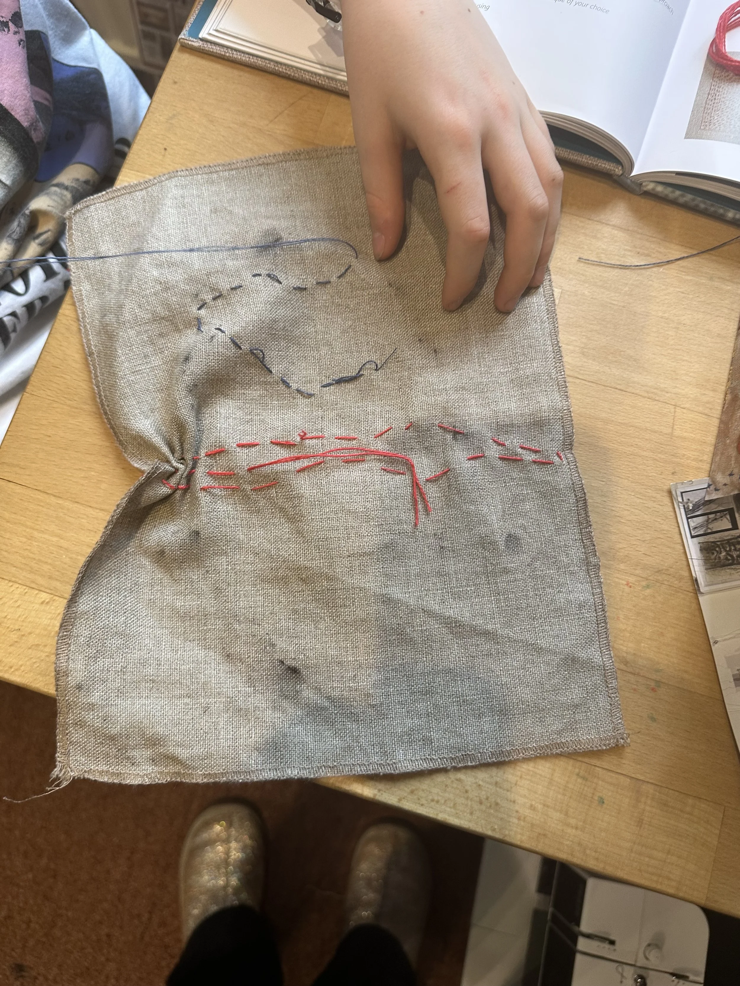 Sam stitching.jpeg