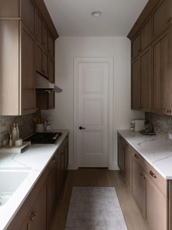 A prep kitchen versus a main kitchen &mdash; designed with intention for both function and feeling. 

The main kitchen is styled, open, and welcoming for gathering and entertaining, while the prep kitchen stays tucked away to handle the mess and dail