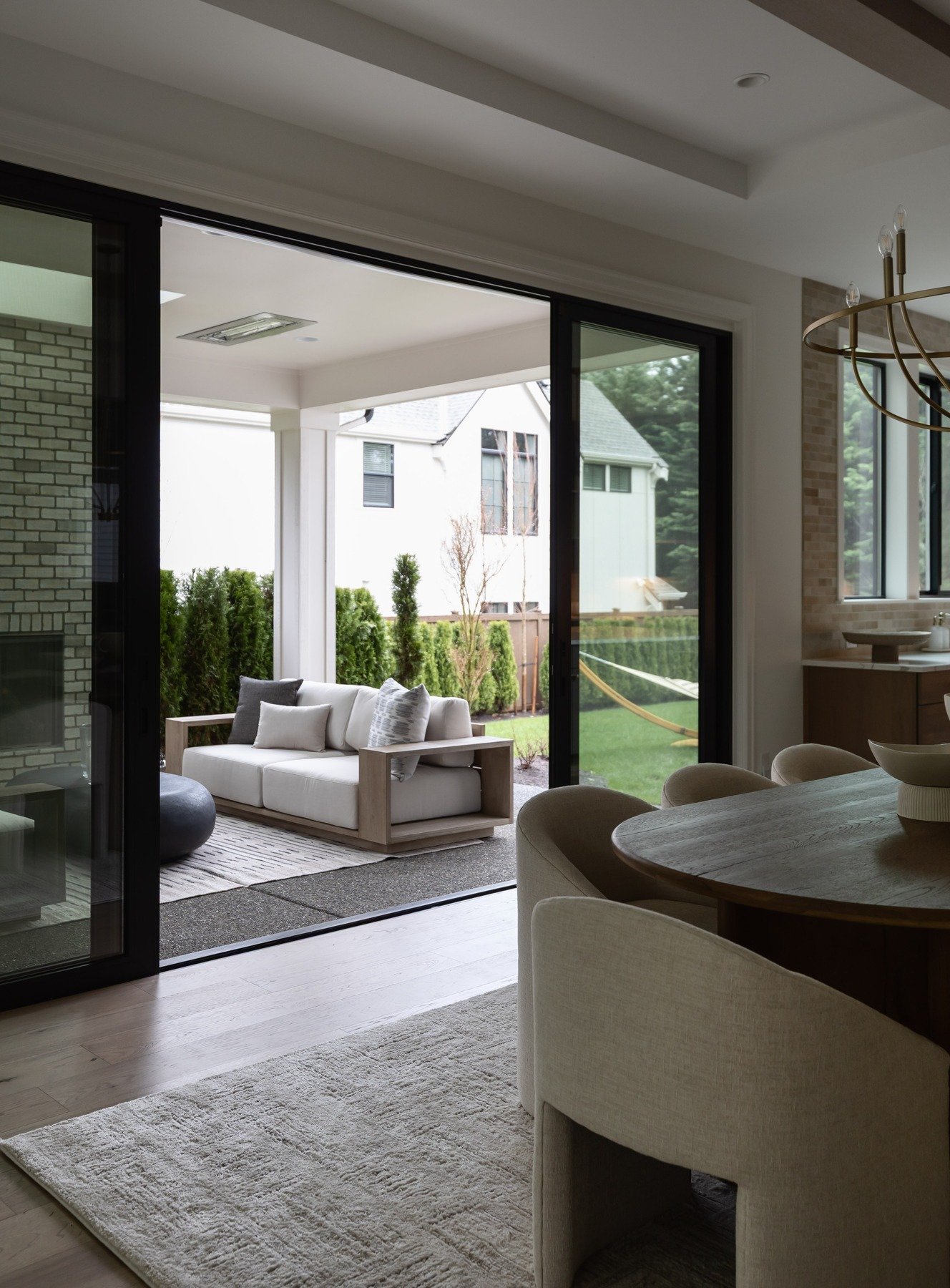 Step outside and call this your daily escape in Washington state. A covered patio keeps you comfortable even when it&rsquo;s raining, so there&rsquo;s no need to head inside. Complete with a cozy fireplace, it&rsquo;s the perfect year-round spot to r